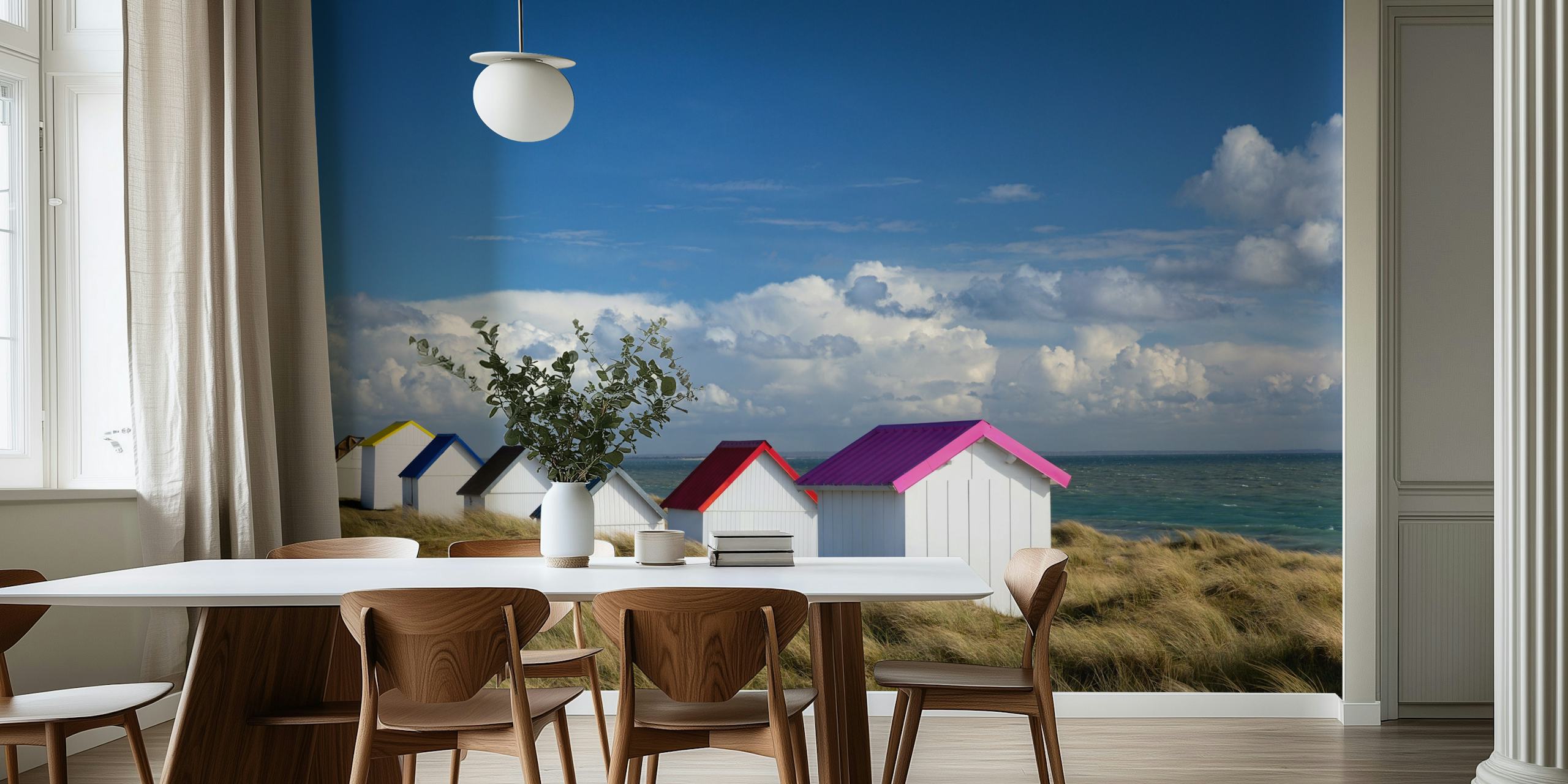 Beach huts in various colors against a blue sky wallpaper