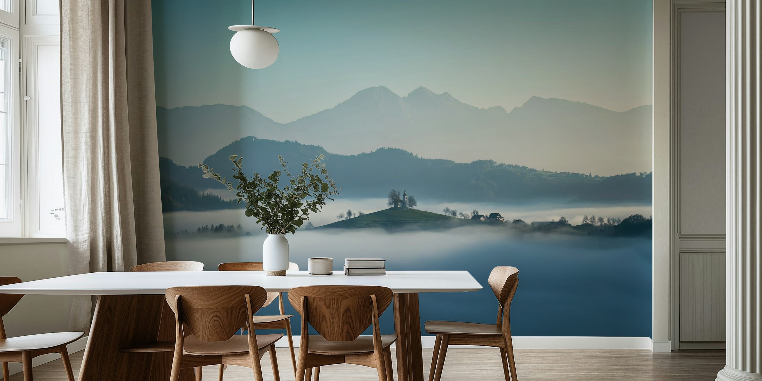 Mountain landscape with misty hills and blue hues wallpaper