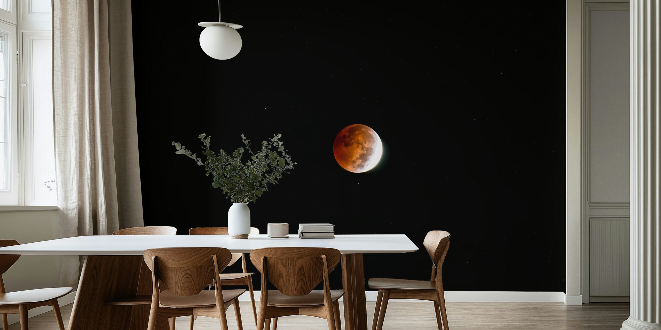 Blood moon eclipse with red hues against a black background wallpaper