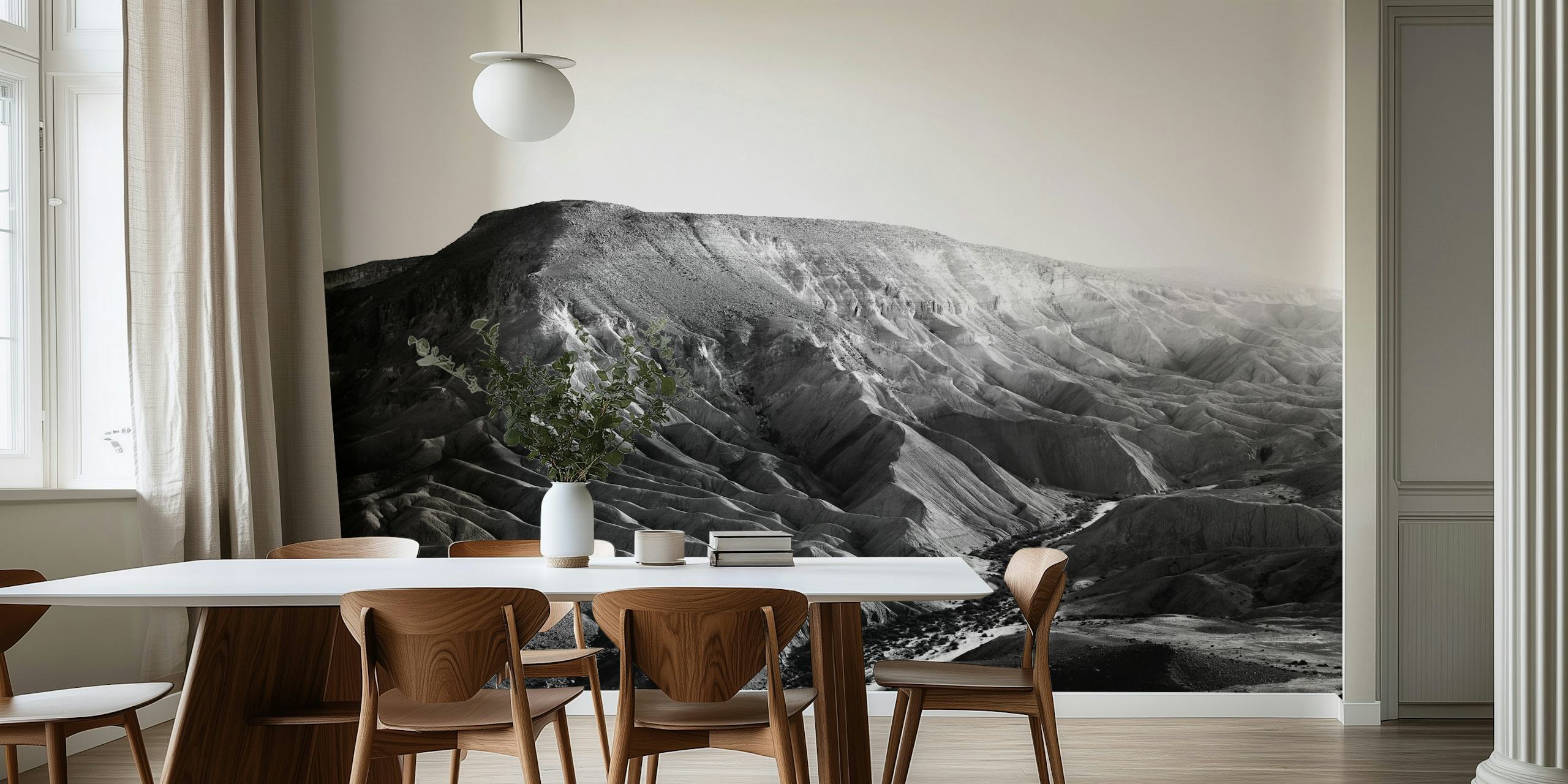 Black and white mountain landscape wallpaper depicting rugged terrain and valleys.
