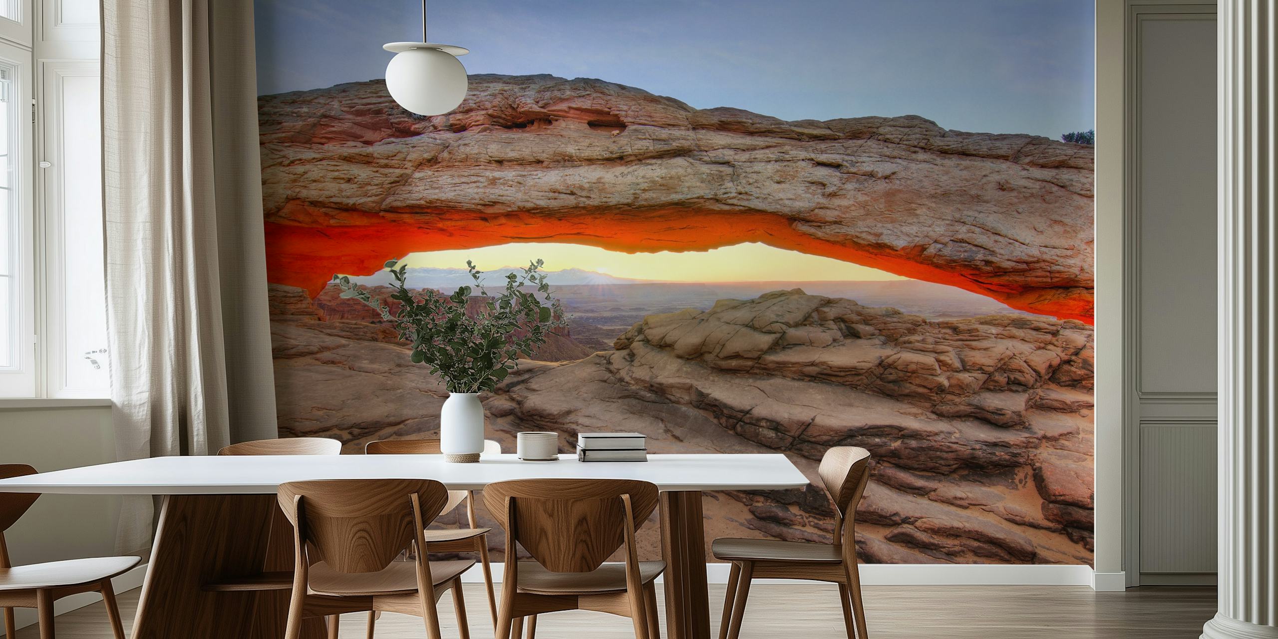 Desert rock arch with sunset view in earthy tones wallpaper