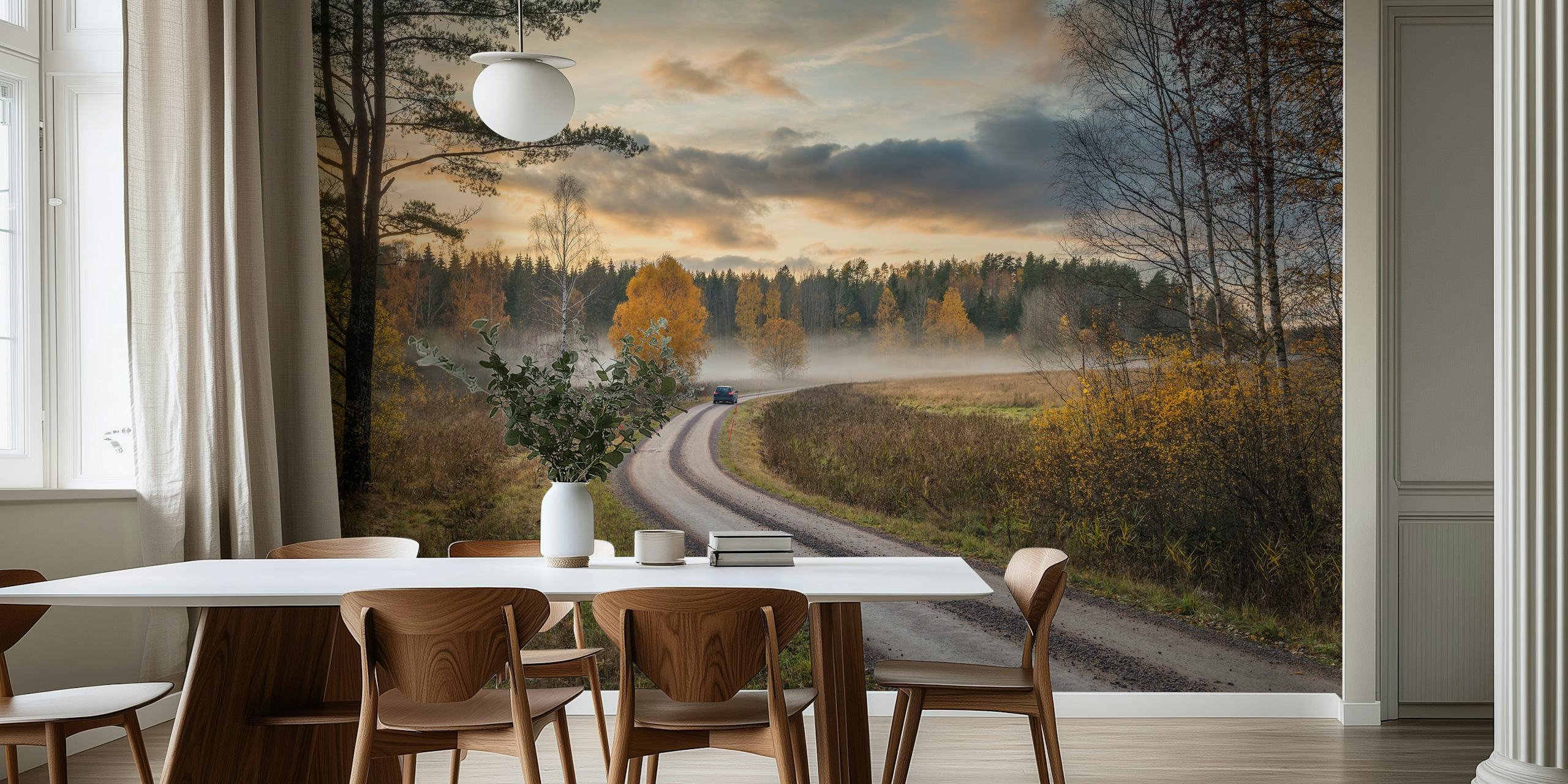 Autumn landscape wallpaper with winding road, yellow trees, and clouds