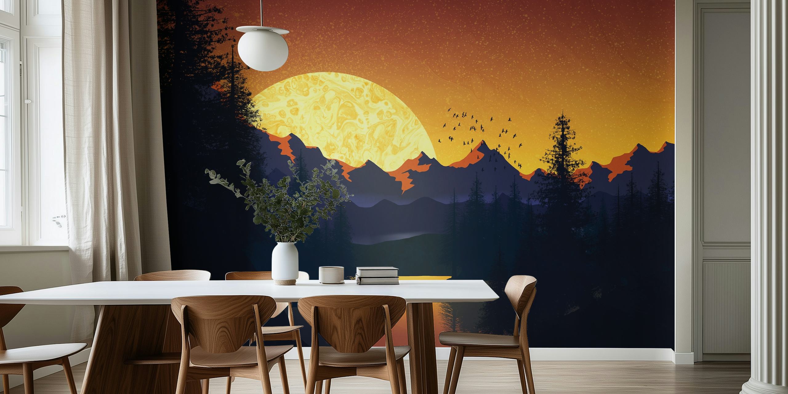 Silhouette of pine trees and mountains against a vibrant sunset wallpaper