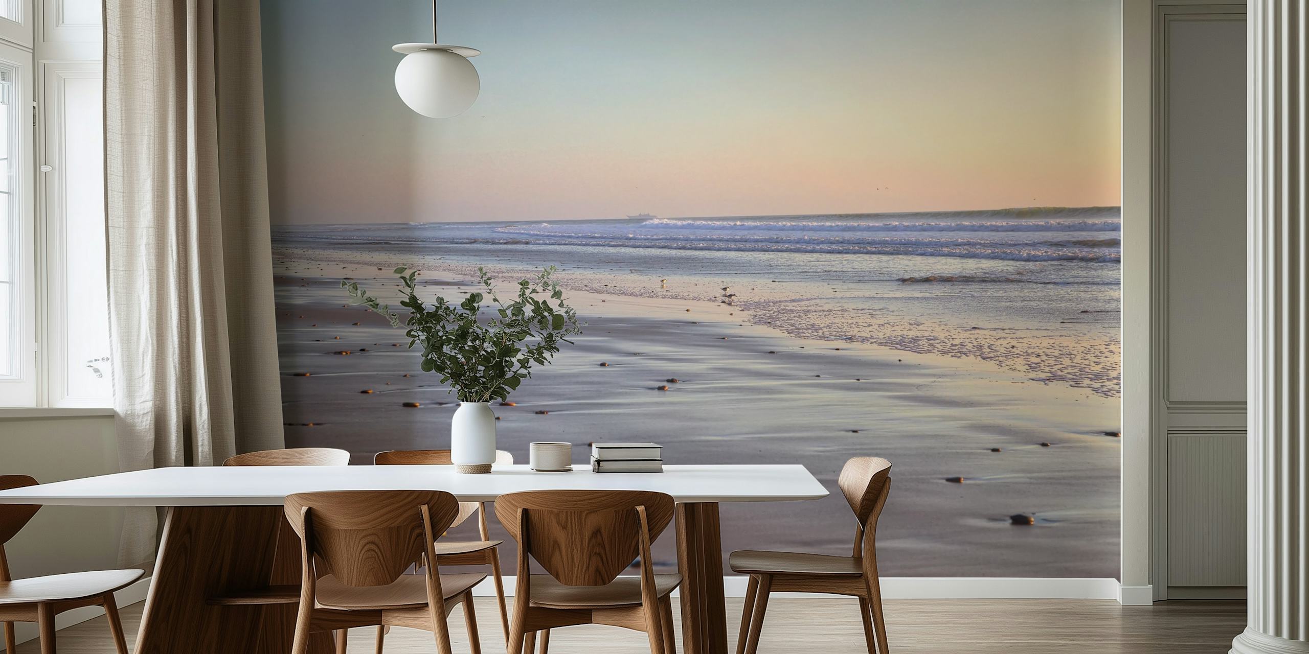 Beach sunset with soft pastels and serene waves wallpaper