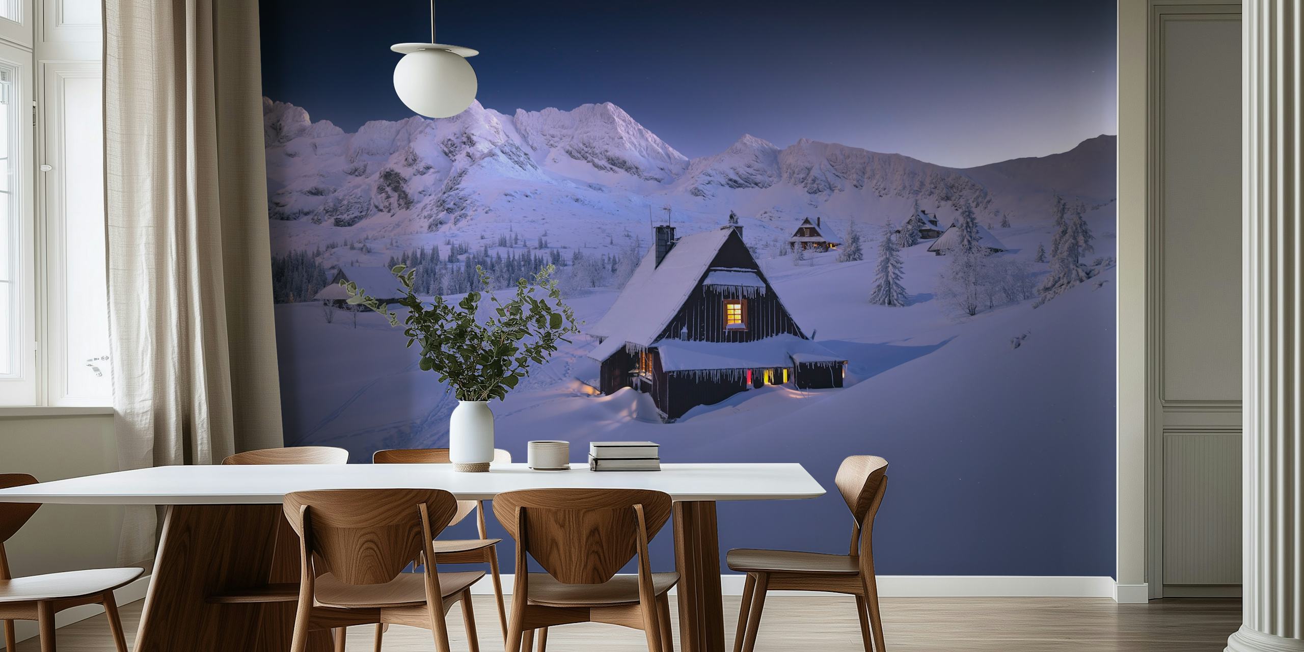 Snowy lodge in mountains at dusk wallpaper