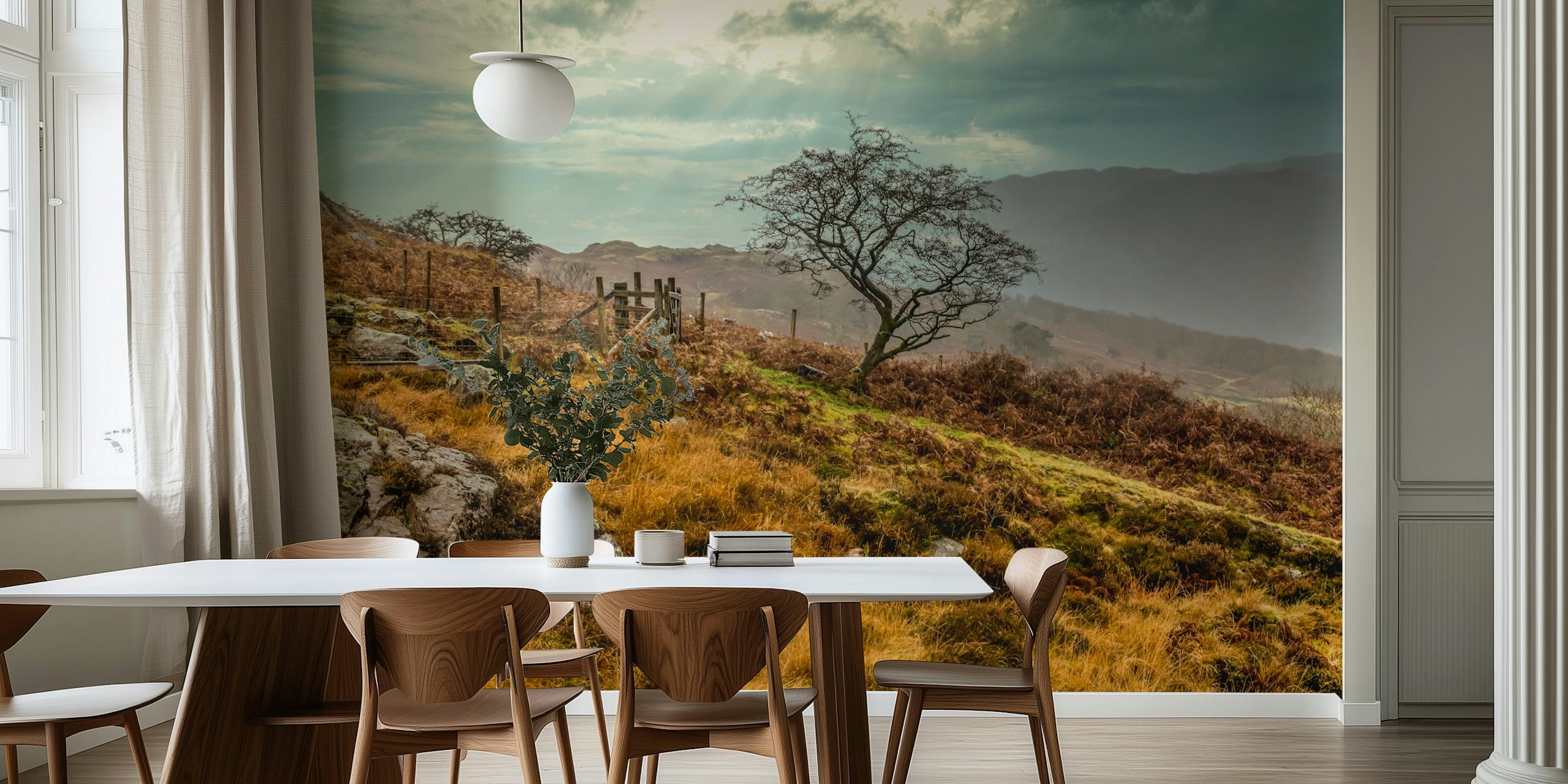 Lush landscape featuring a tree, rocky terrain, and cloudy skies wallpaper