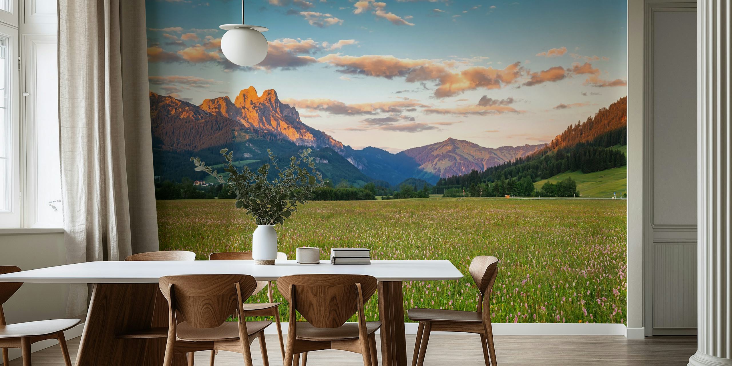 Scenic mountain view with green fields and blue sky wallpaper