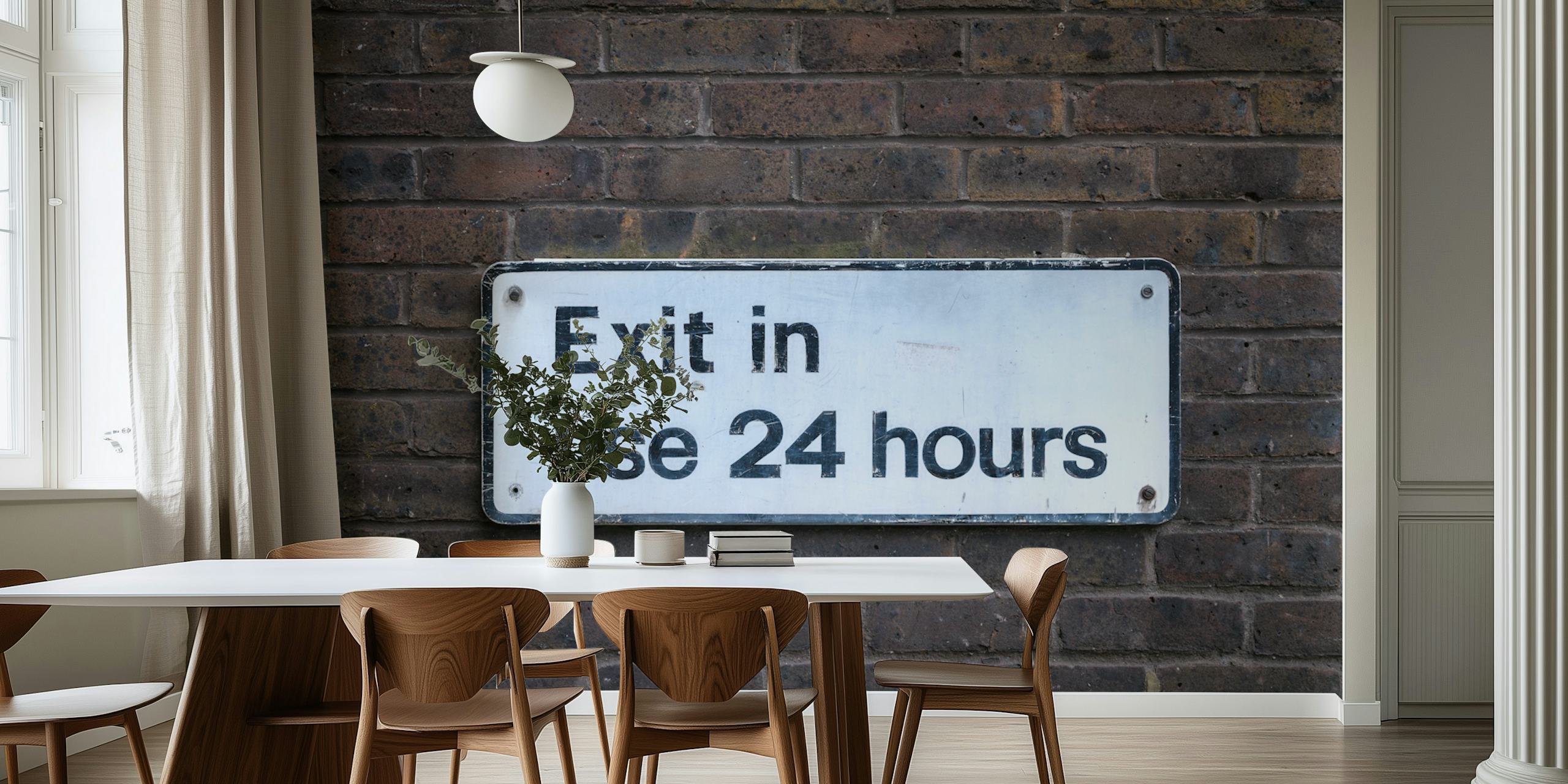 Sign board on brick wall