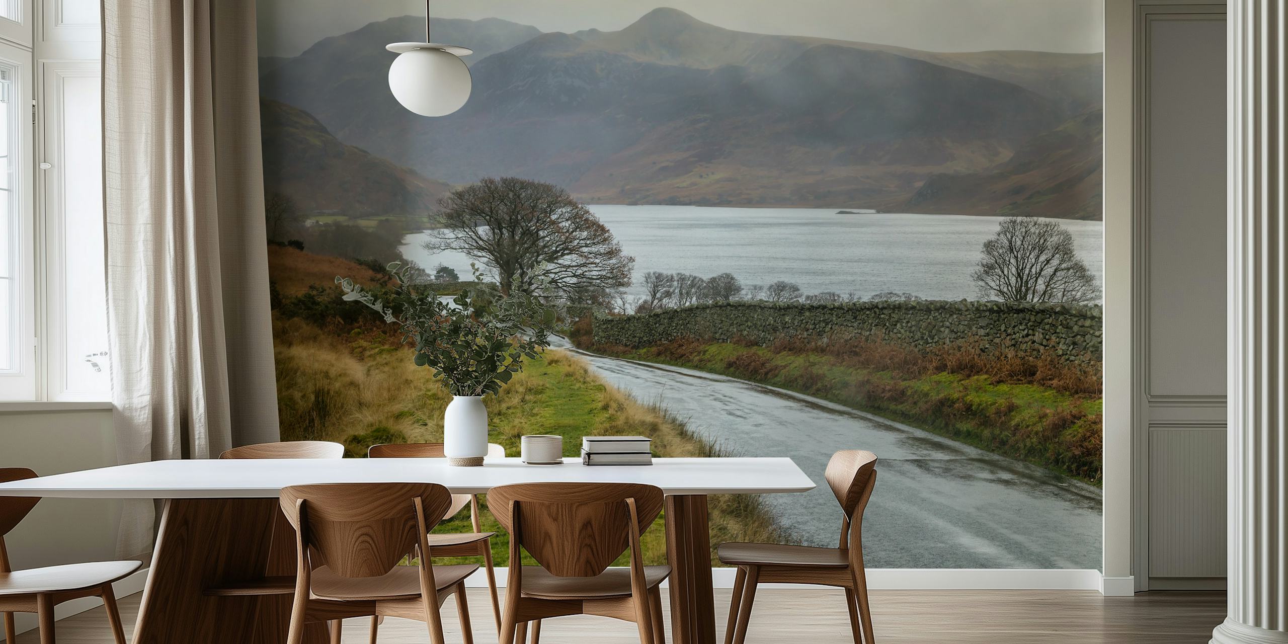 British Lake District countryside with winding road beside a serene lake