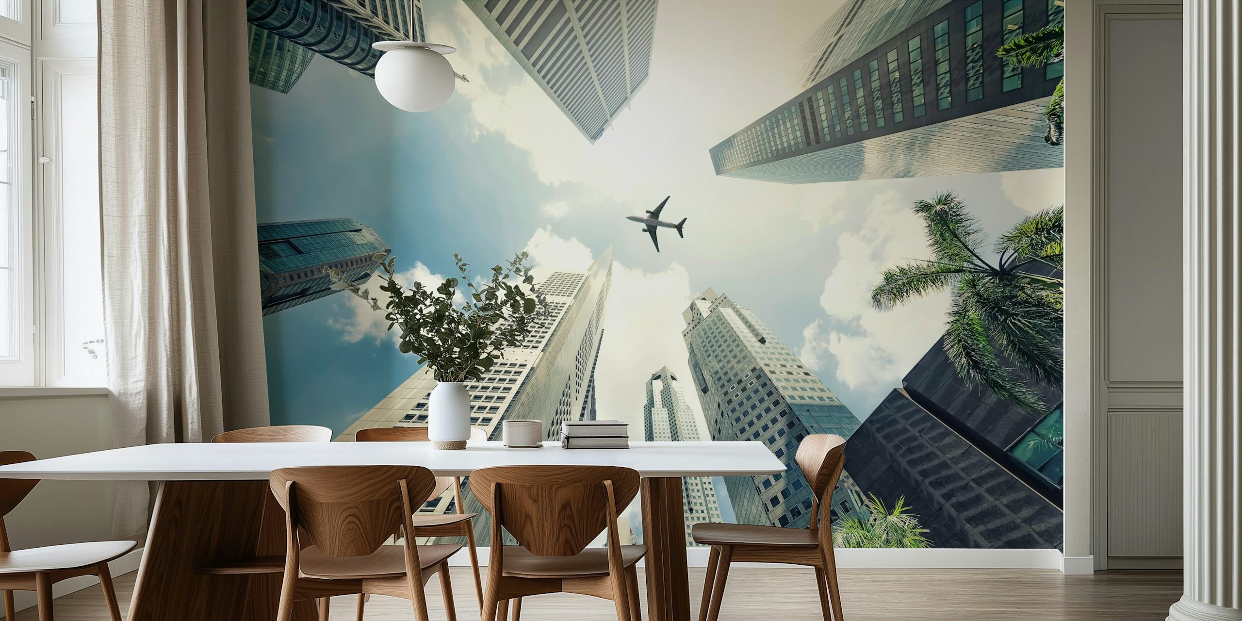 Aerial view of urban high-rises and airplane in the sky wallpaper