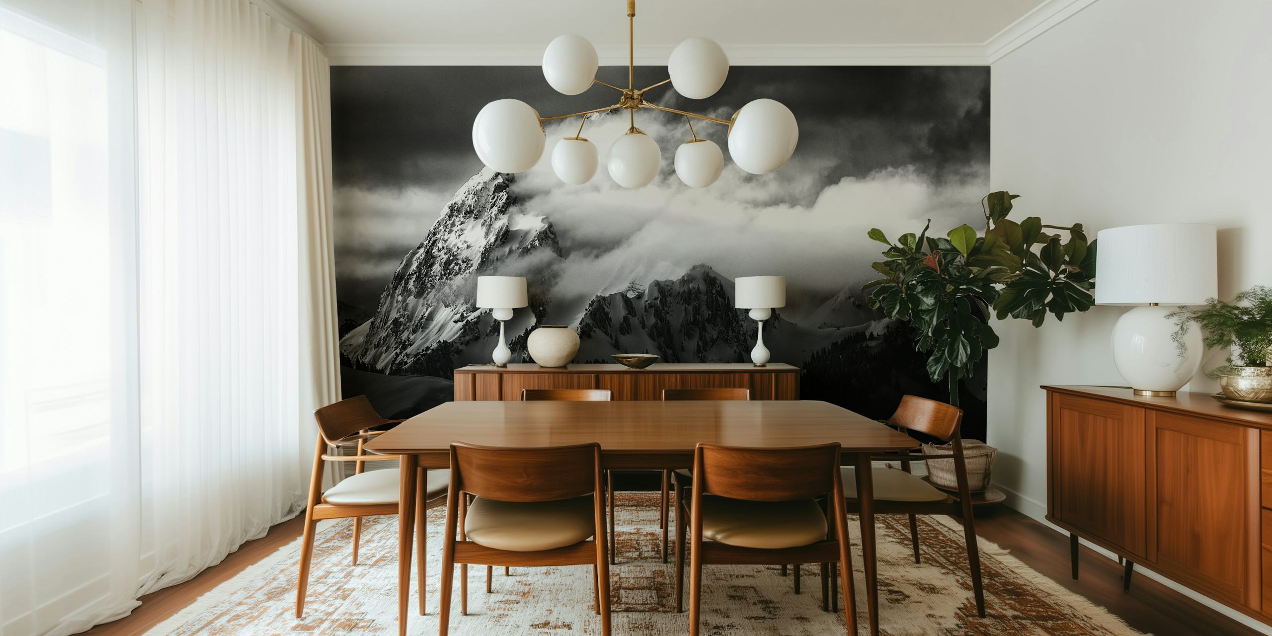 Black and white wall mural with mountain peak and swirling clouds