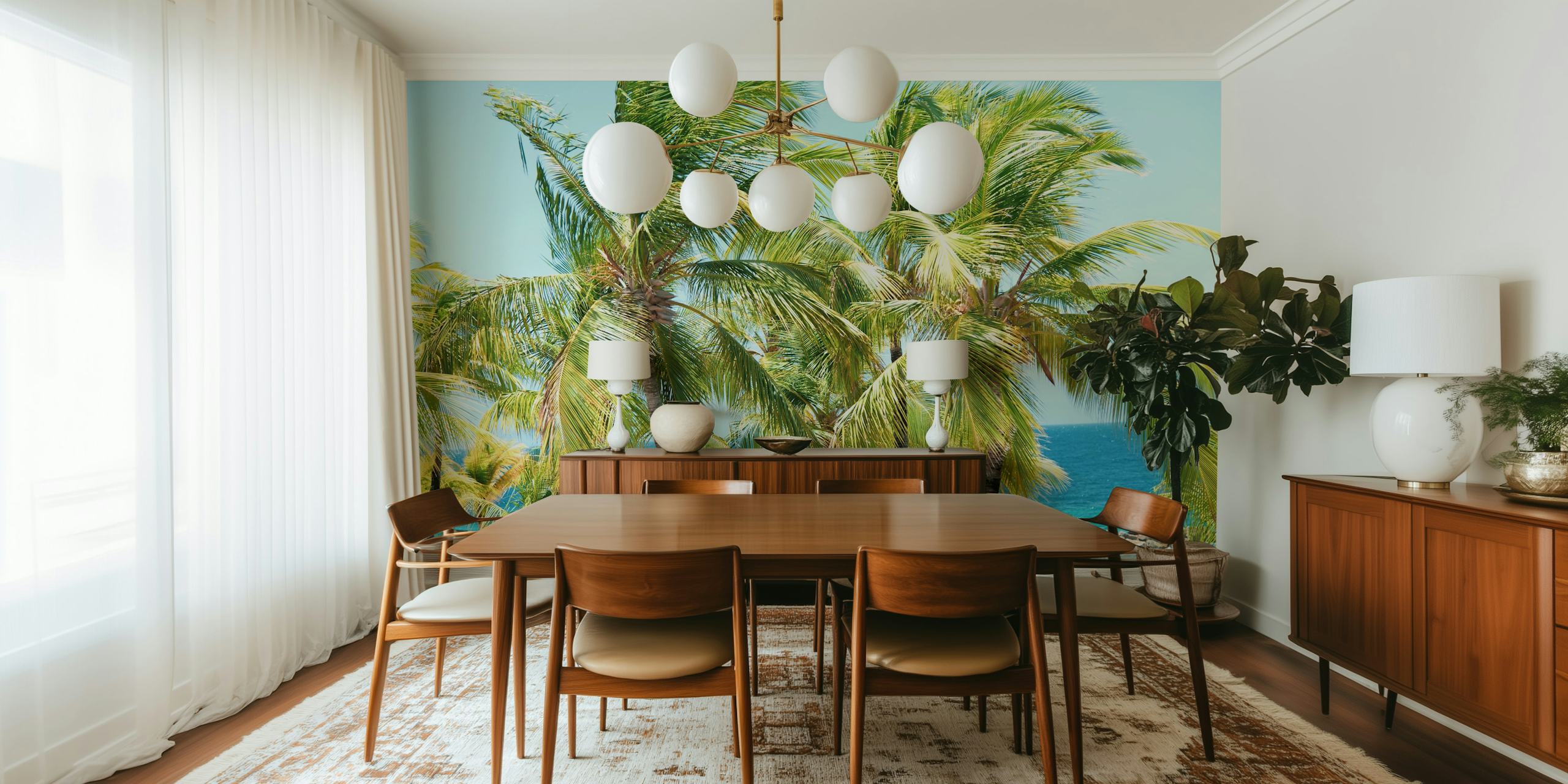 Tall green palm trees against a bright blue ocean wallpaper