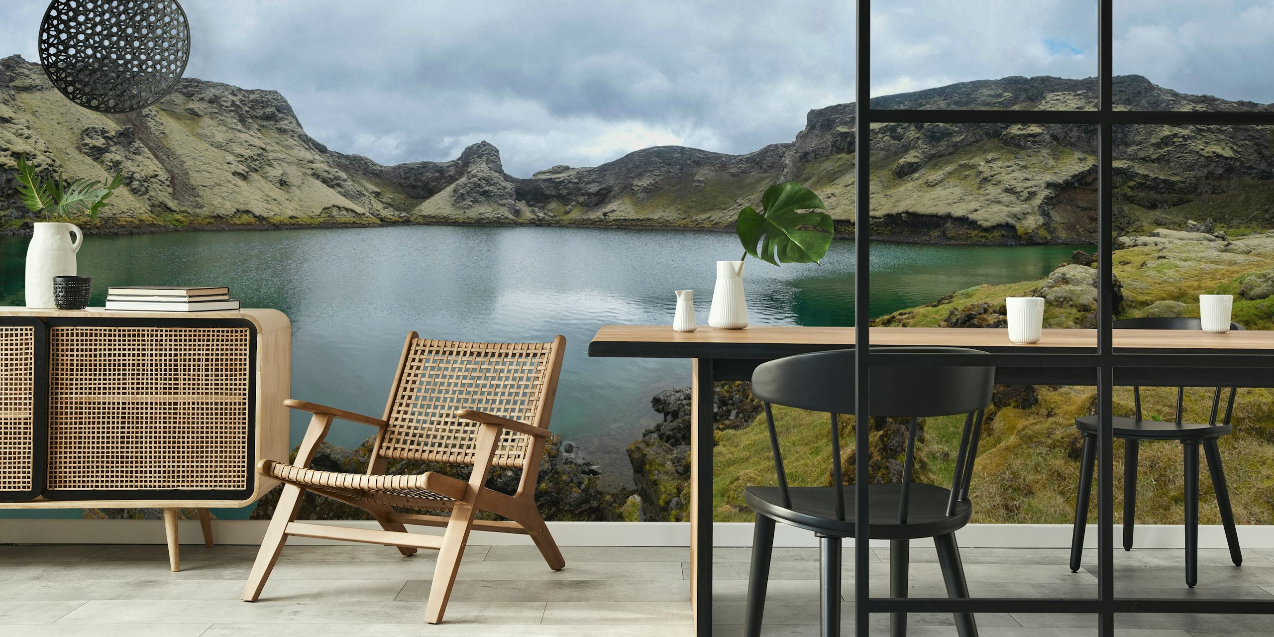 Scenic view of Laki Crater Lake showcasing green water and rocky shores wall mural