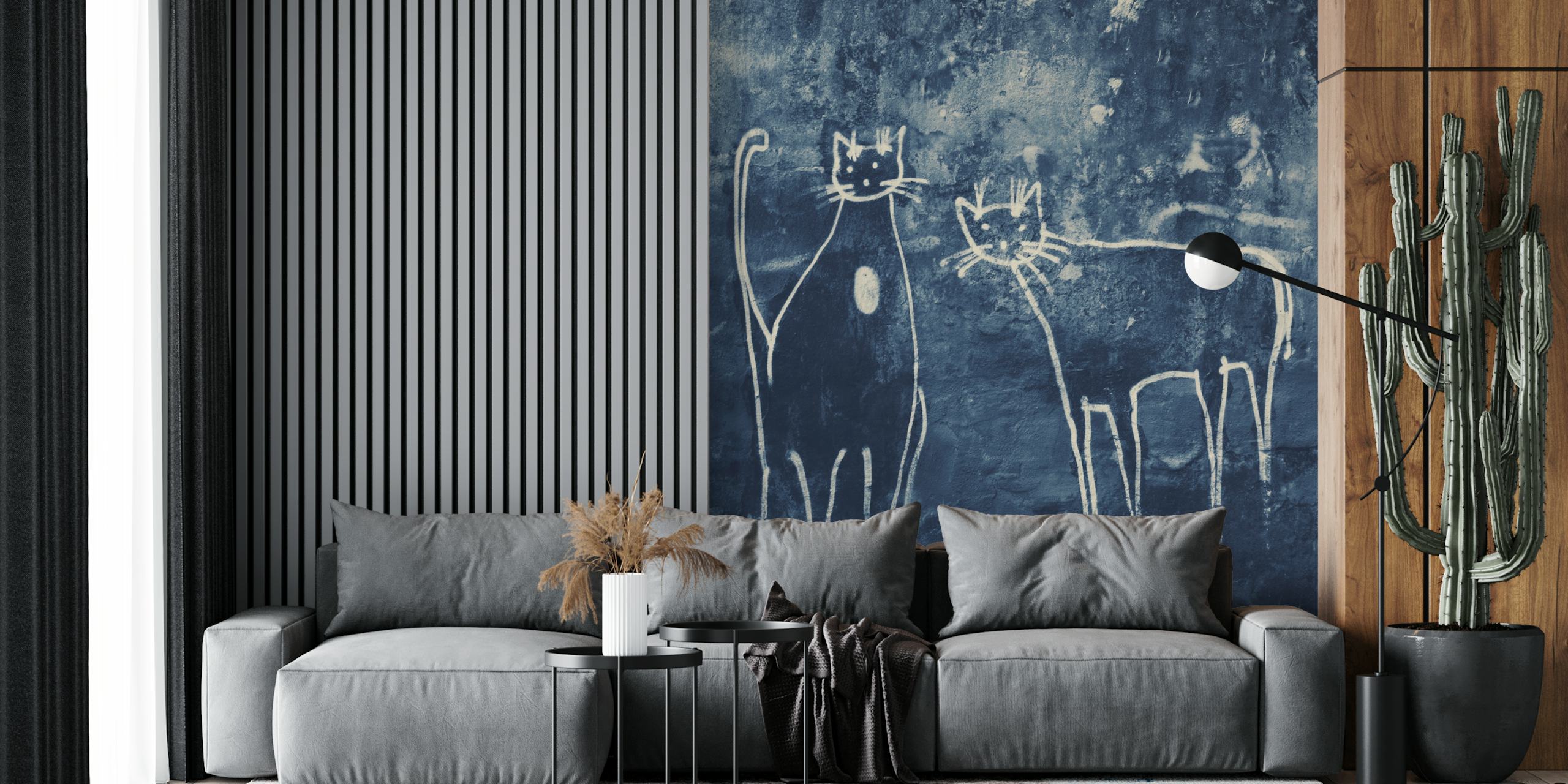 Two white graffiti cats on a dark blue textured wall mural