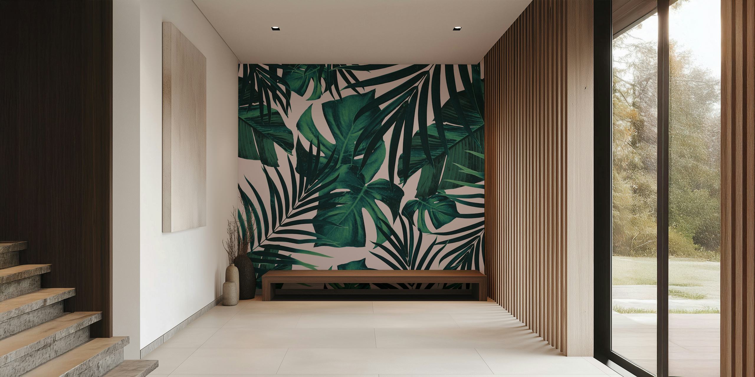 Tropical leaves in green hues on soft pink background wallpaper