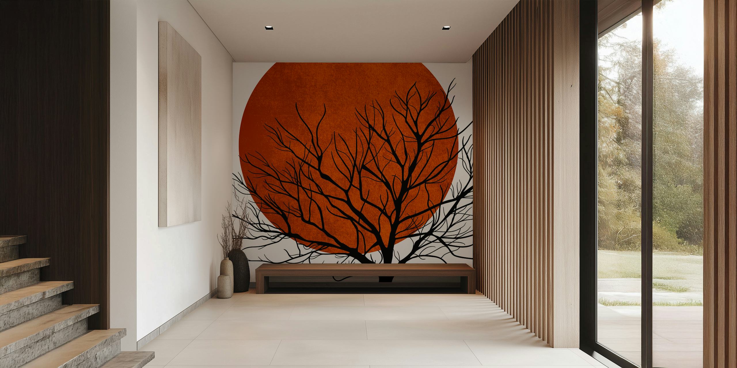 Carta da parati raffigurante la silhouette di un albero spoglio sullo sfondo di un tramonto invernale arancione