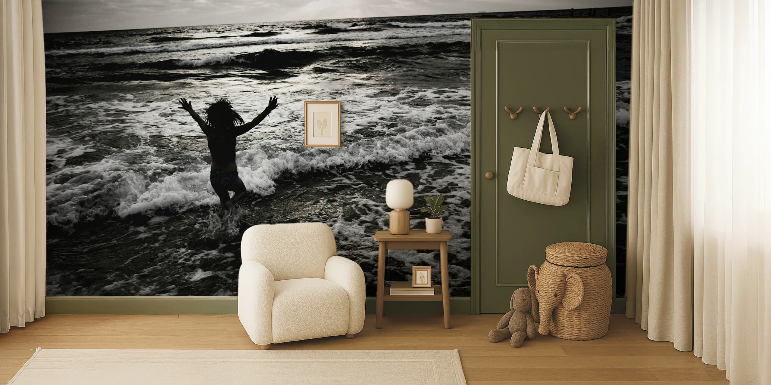 Person jumping in the ocean with waves crashing around, black and white wallpaper