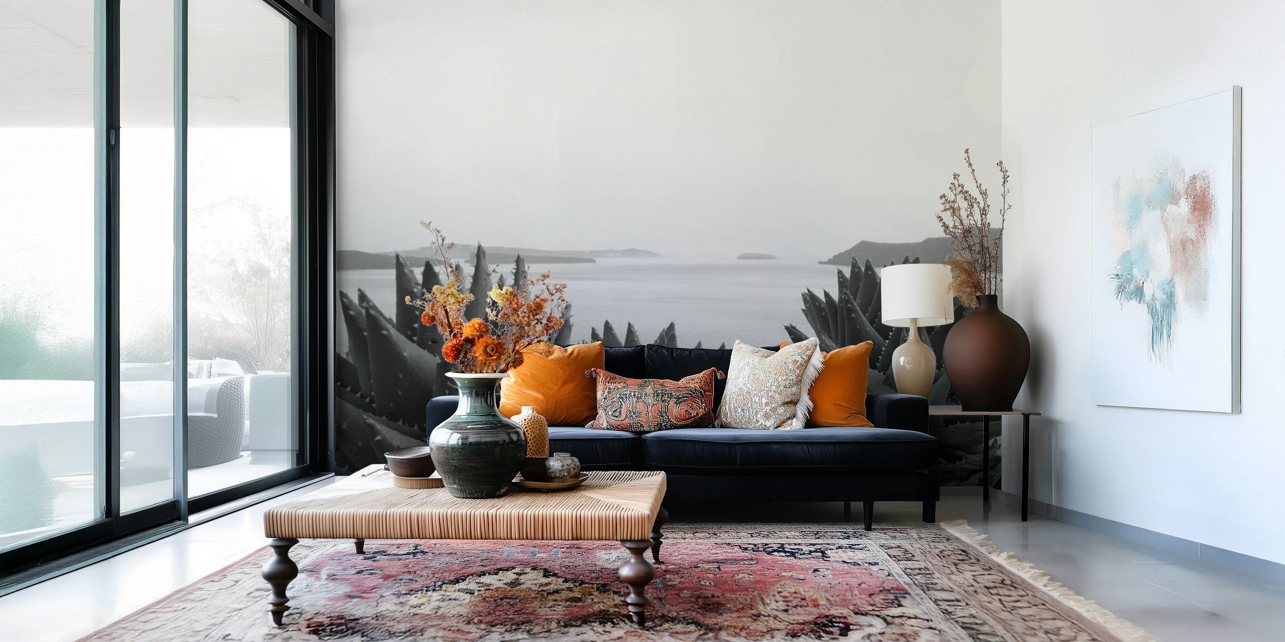 Black and white wallpaper featuring coastal landscape with spiky plants and distant islands