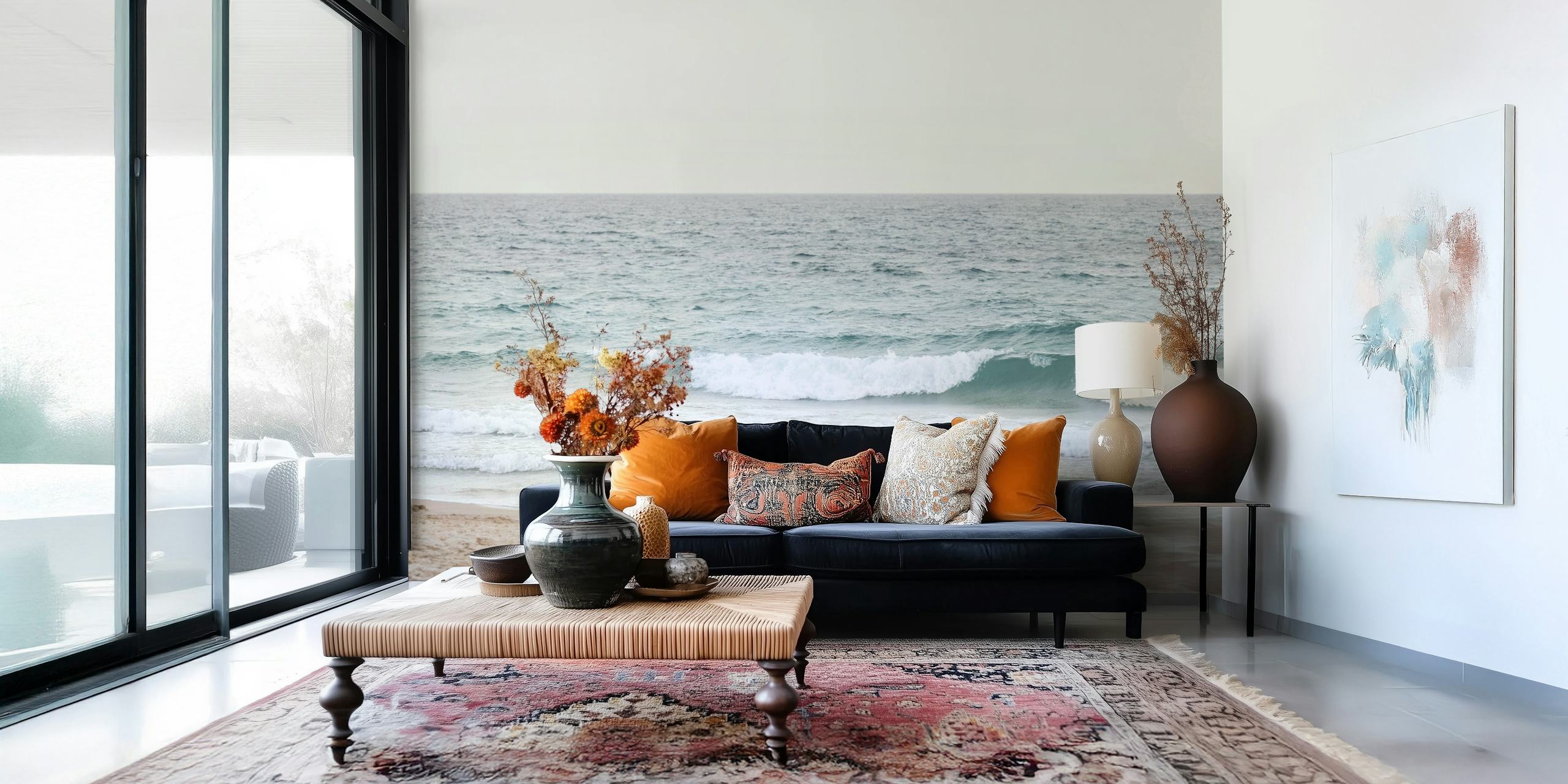 Ocean waves on a beach with soft beige sand and blue water wallpaper