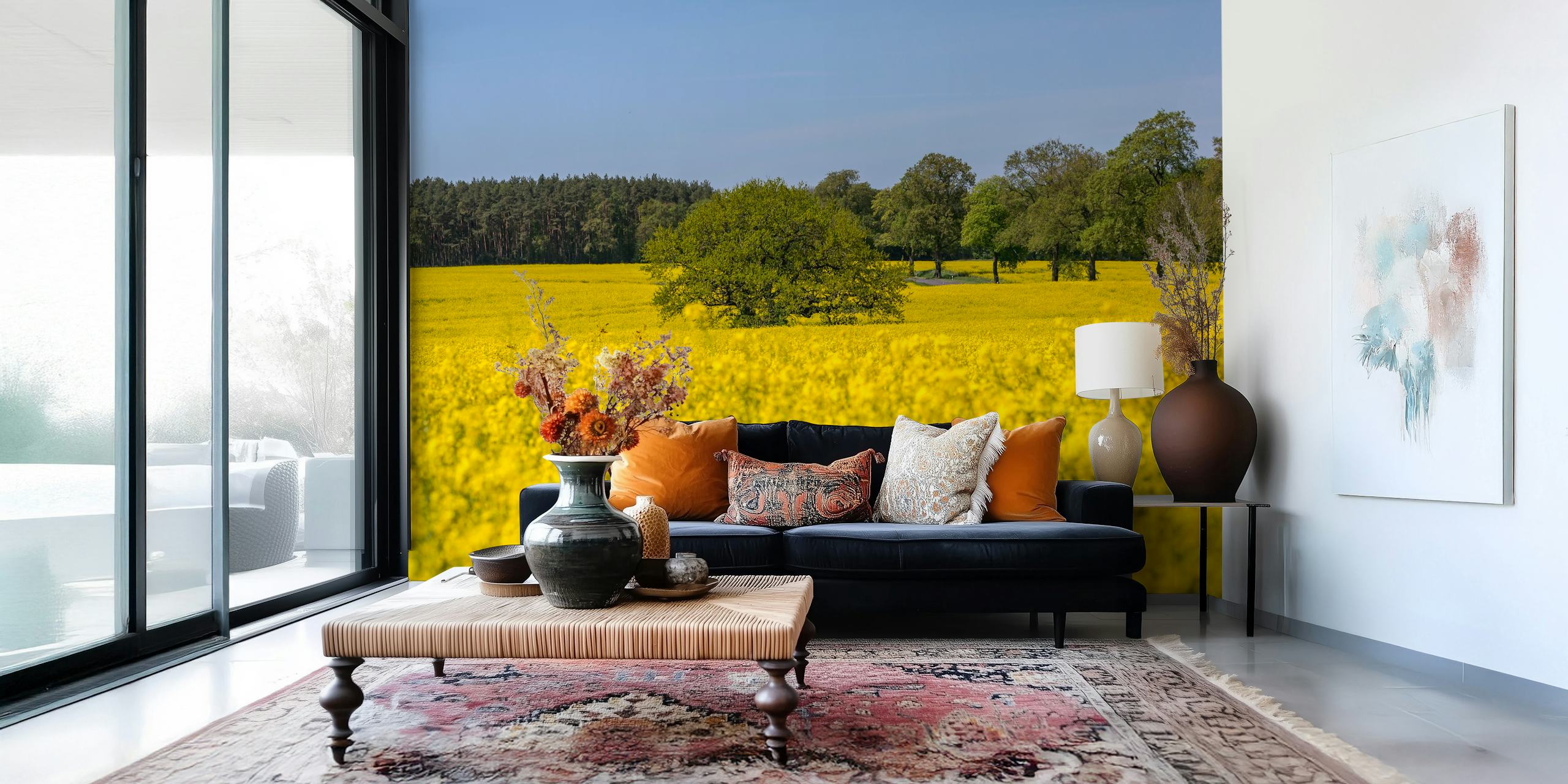 Yellow flowering rapeseed field with greenery wallpaper