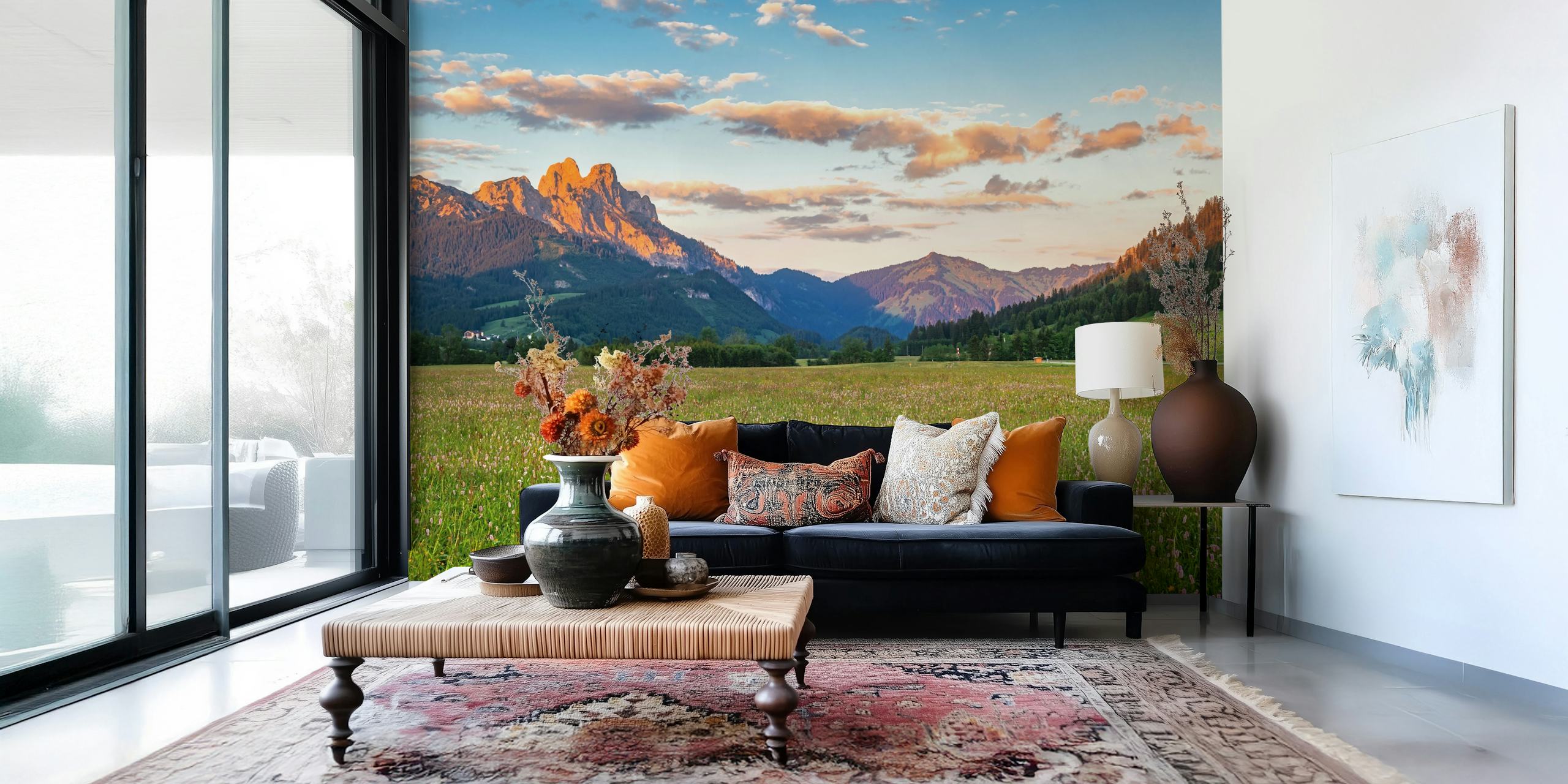 Scenic mountain view with green fields and blue sky wallpaper