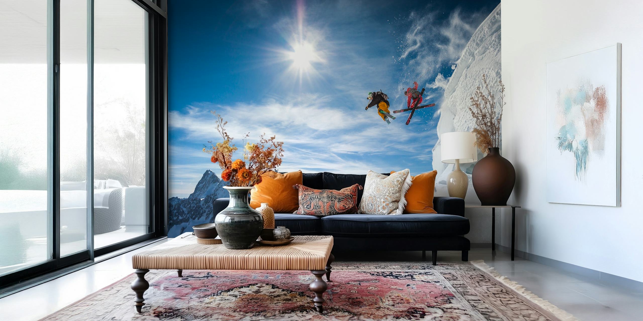 Two skiers jumping over snowy mountains with a bright blue sky, action-packed wallpaper
