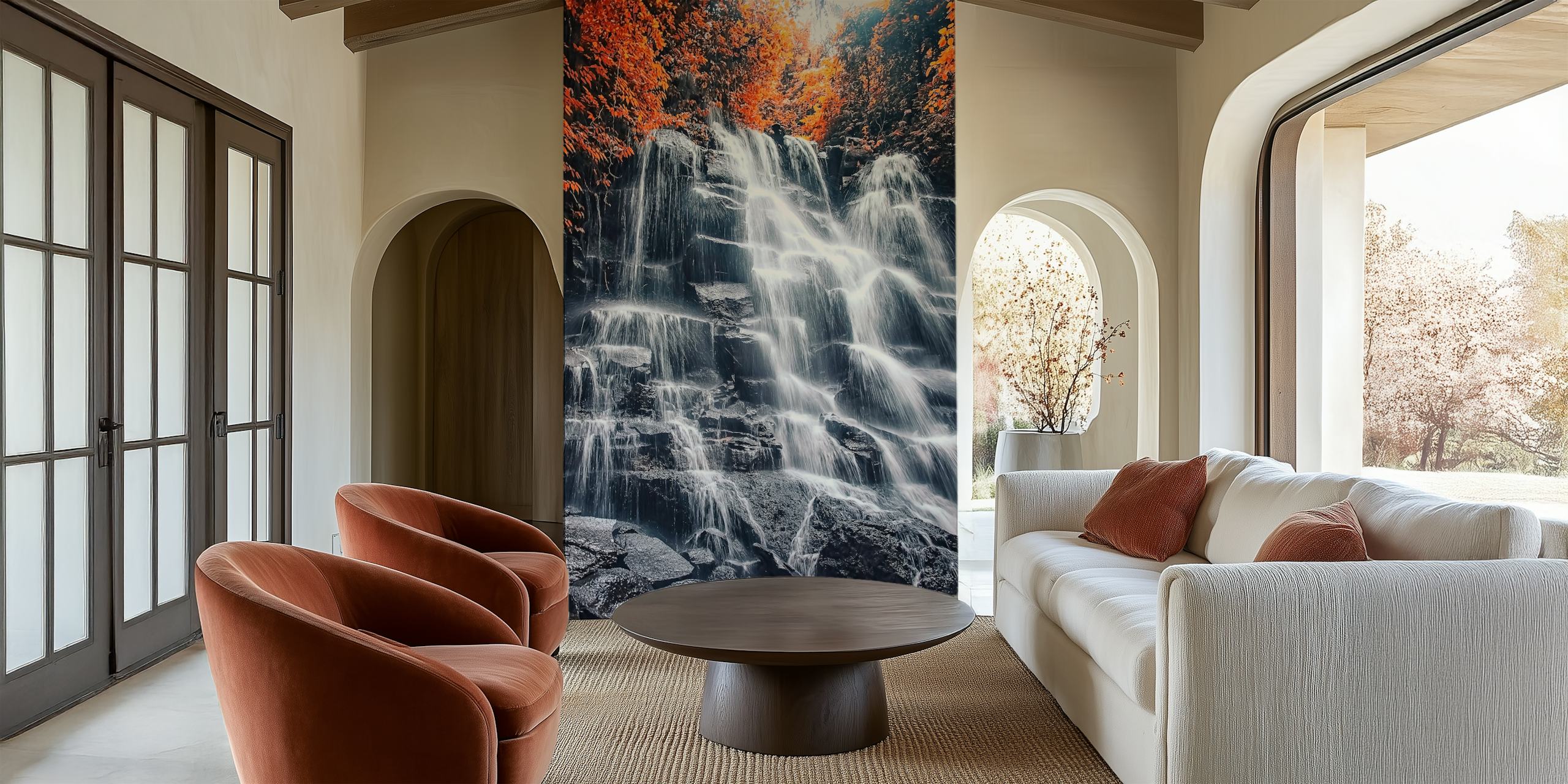 Waterfall flowing over rocks surrounded by orange leaves wallpaper