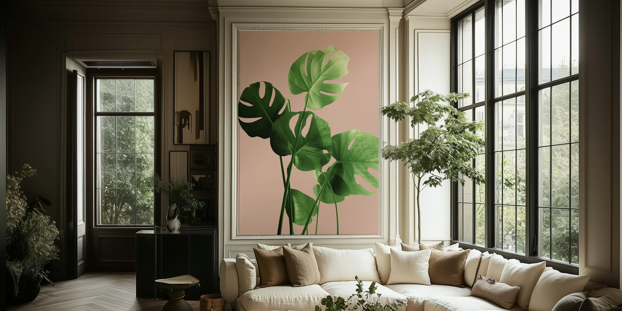 Tropical monstera leaves in green on a pale terracotta background wallpaper