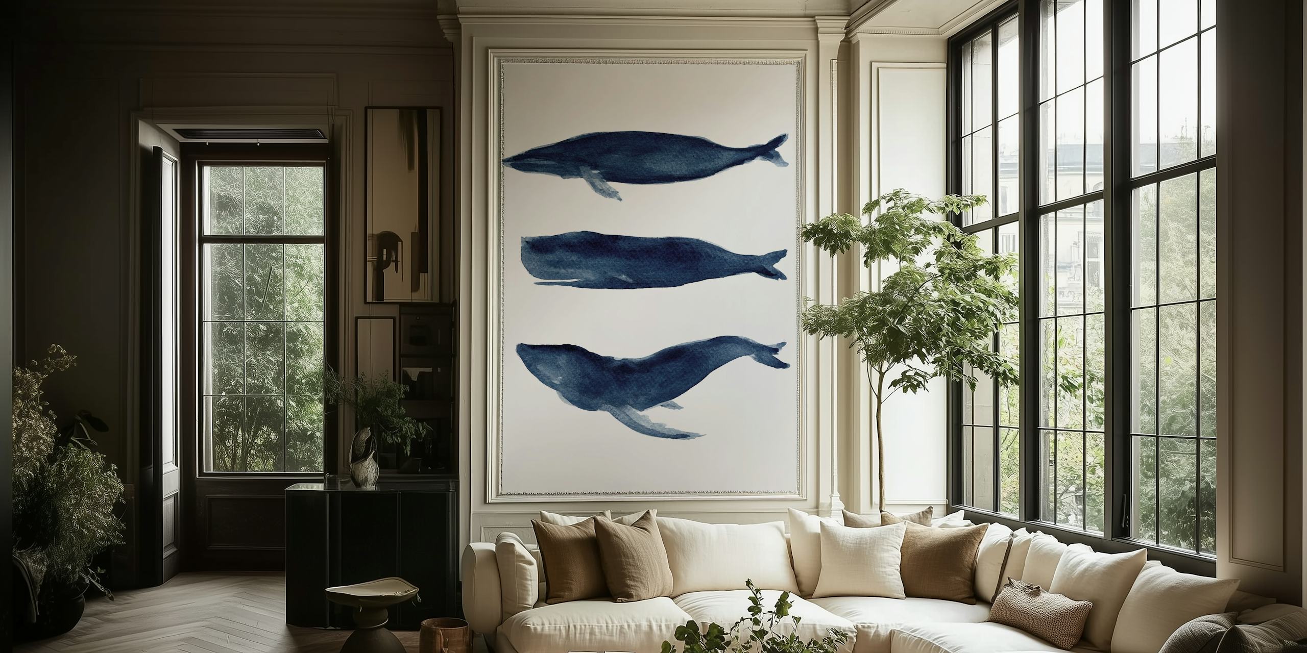 Illustrazione di tre balene blu su un murale su sfondo bianco