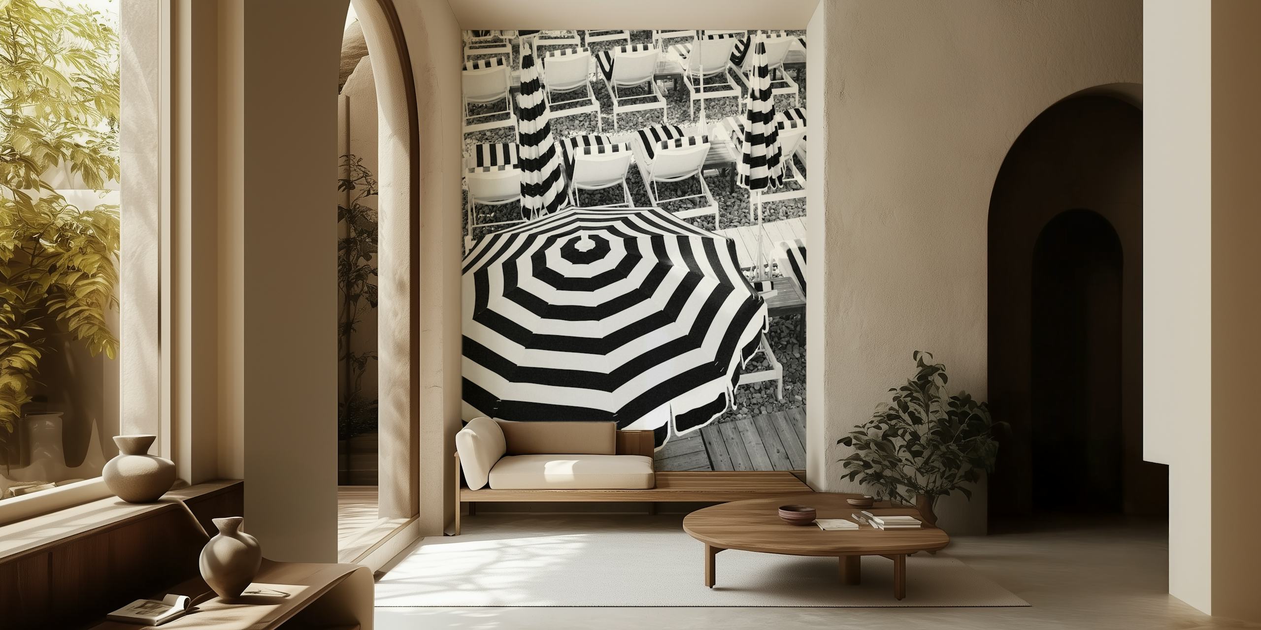 Monochrome wall mural featuring beach umbrellas and chairs in a striped pattern.