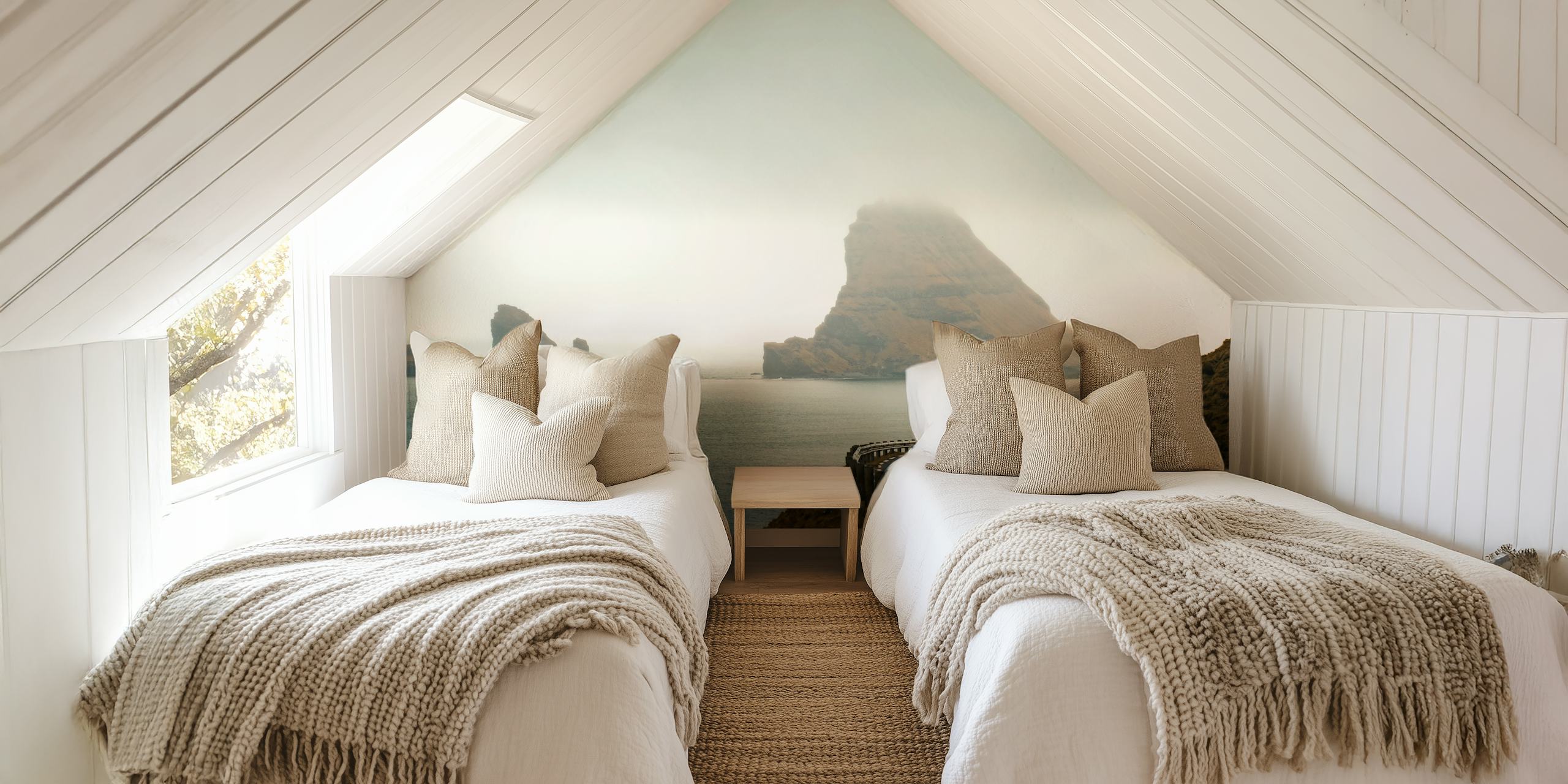 Coastal landscape with misty hills and rocky formations wallpaper