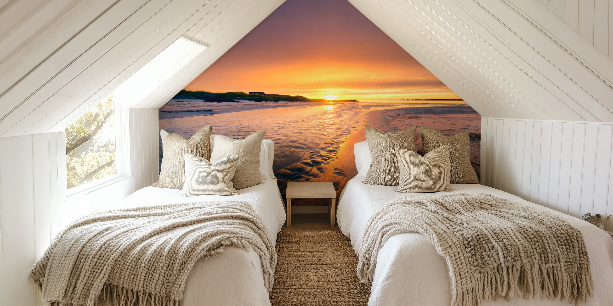 A tranquil beach scene at sunset with footprints in the sand wall mural.