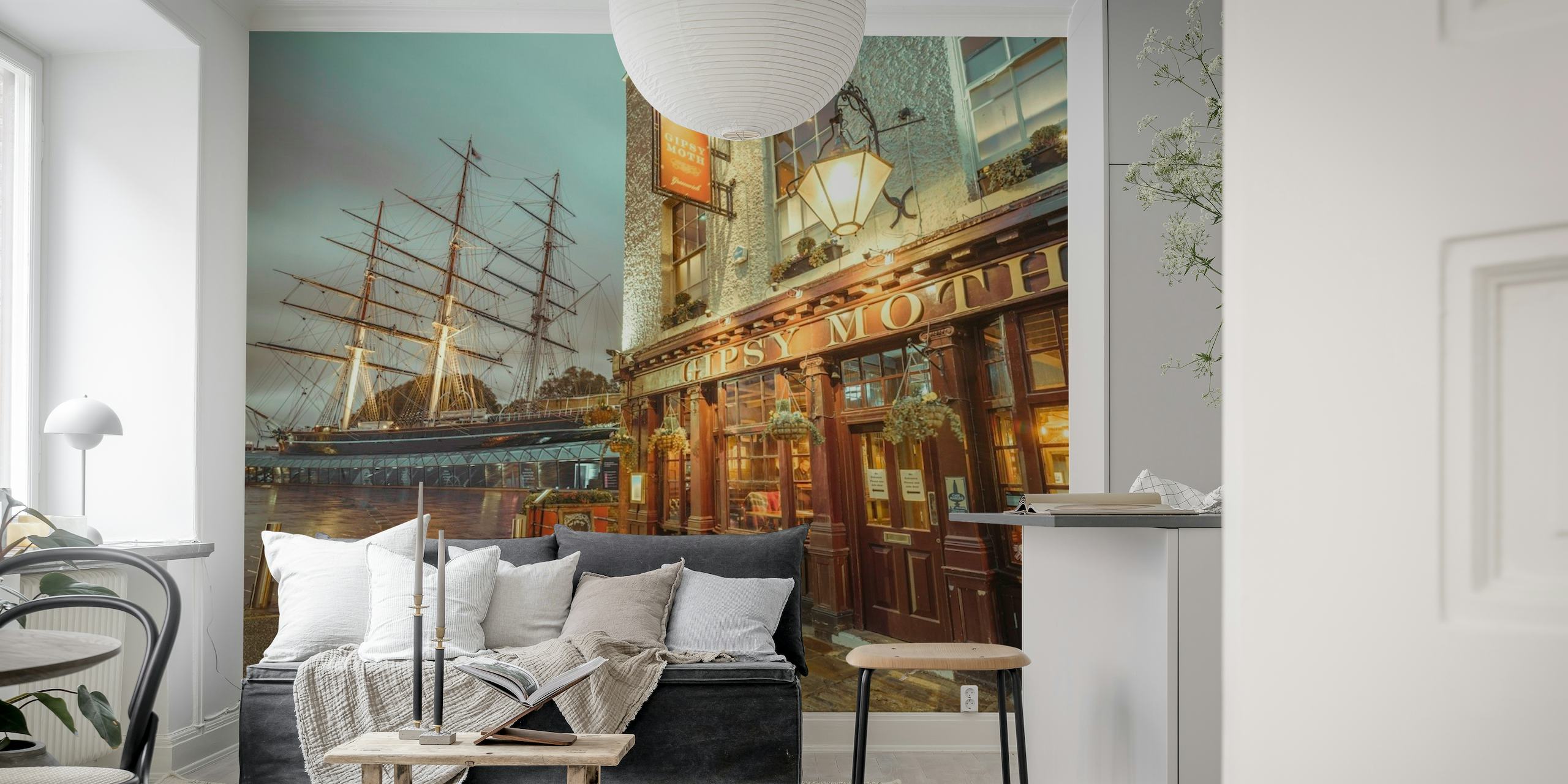 Thames riverside scene with historical pub and tall ship wall mural