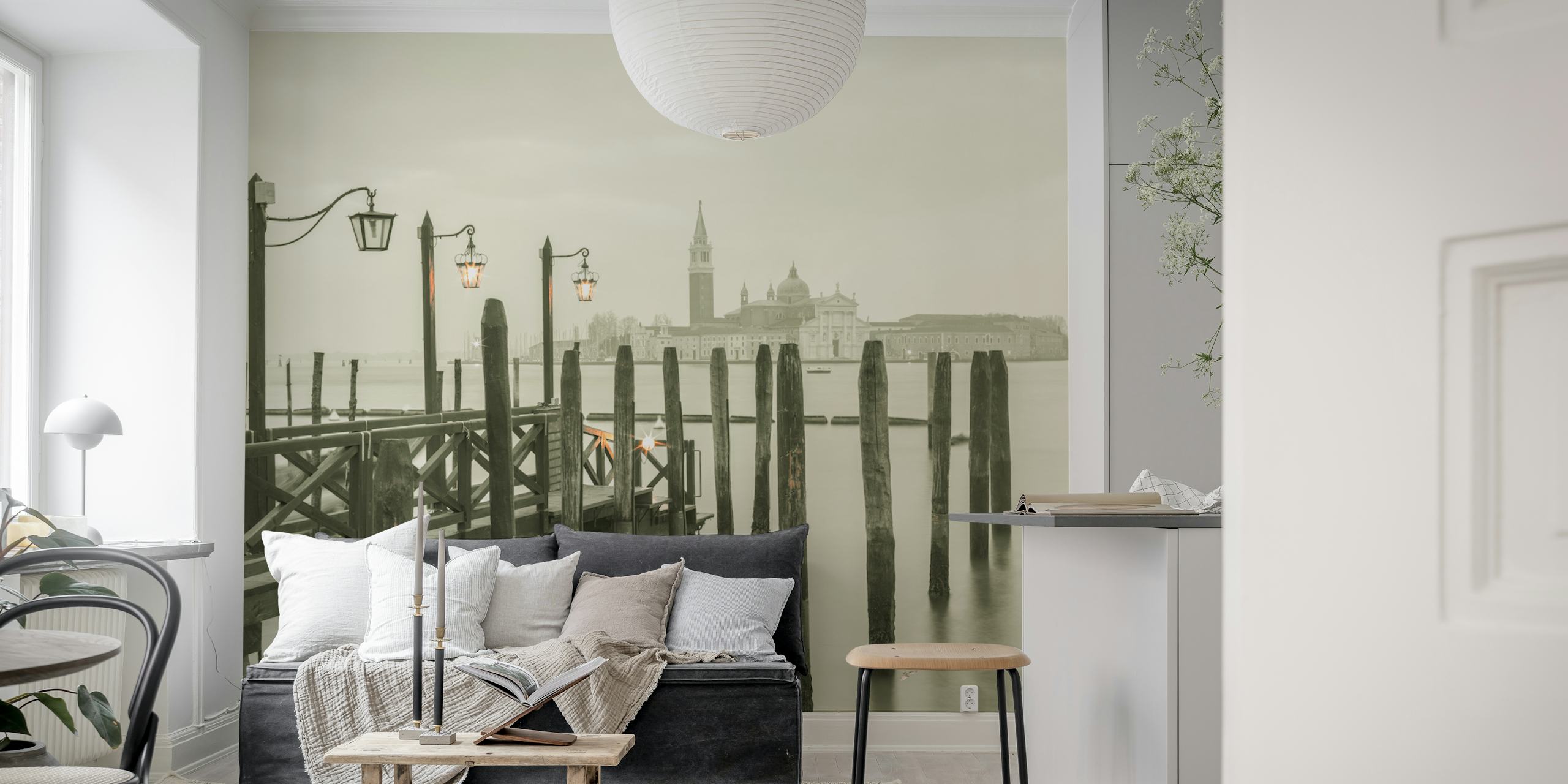 Waterside reflection with pilings and buildings in black and white wallpaper
