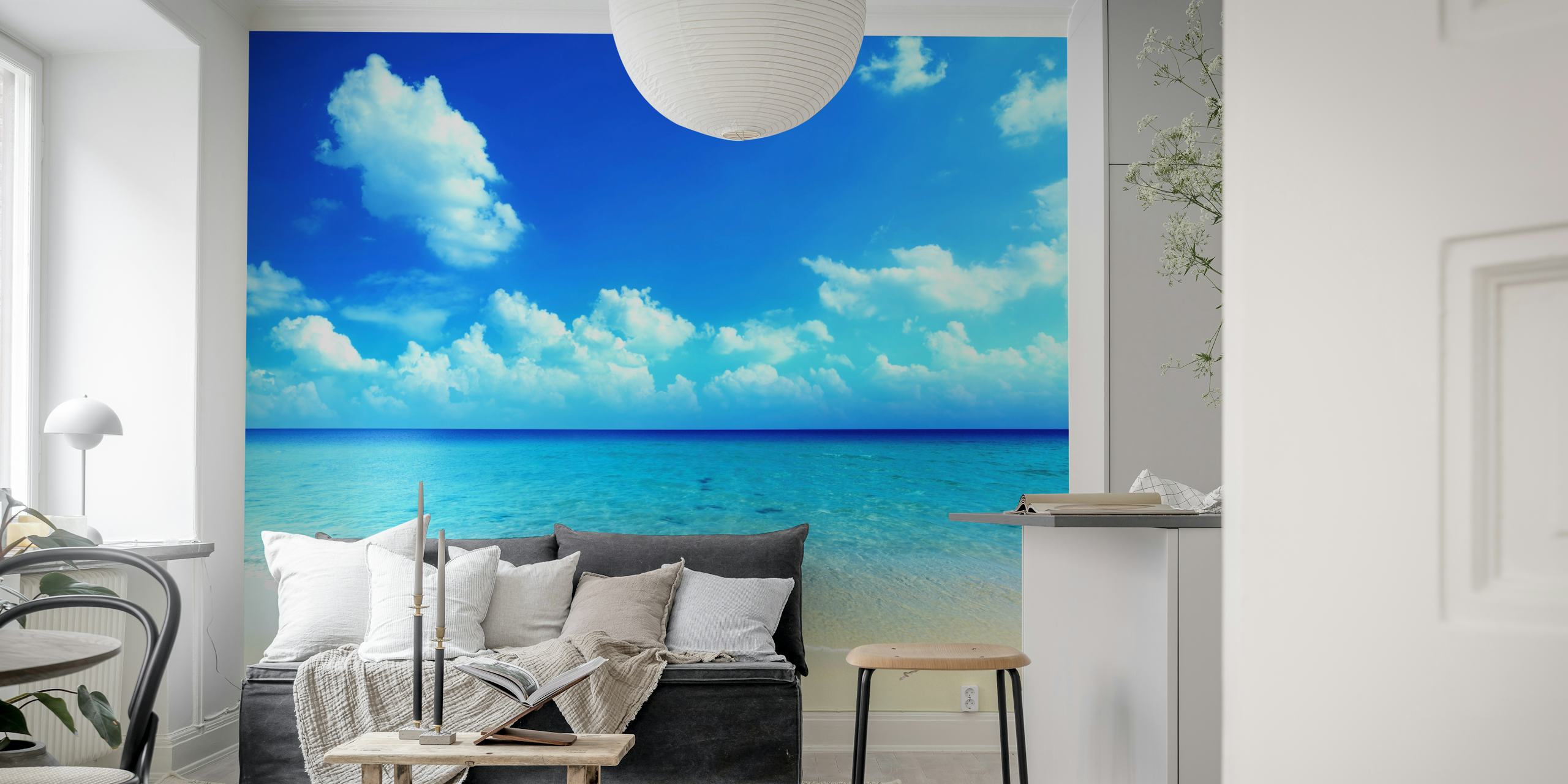Tropical beach scene with blue ocean and clouds wallpaper
