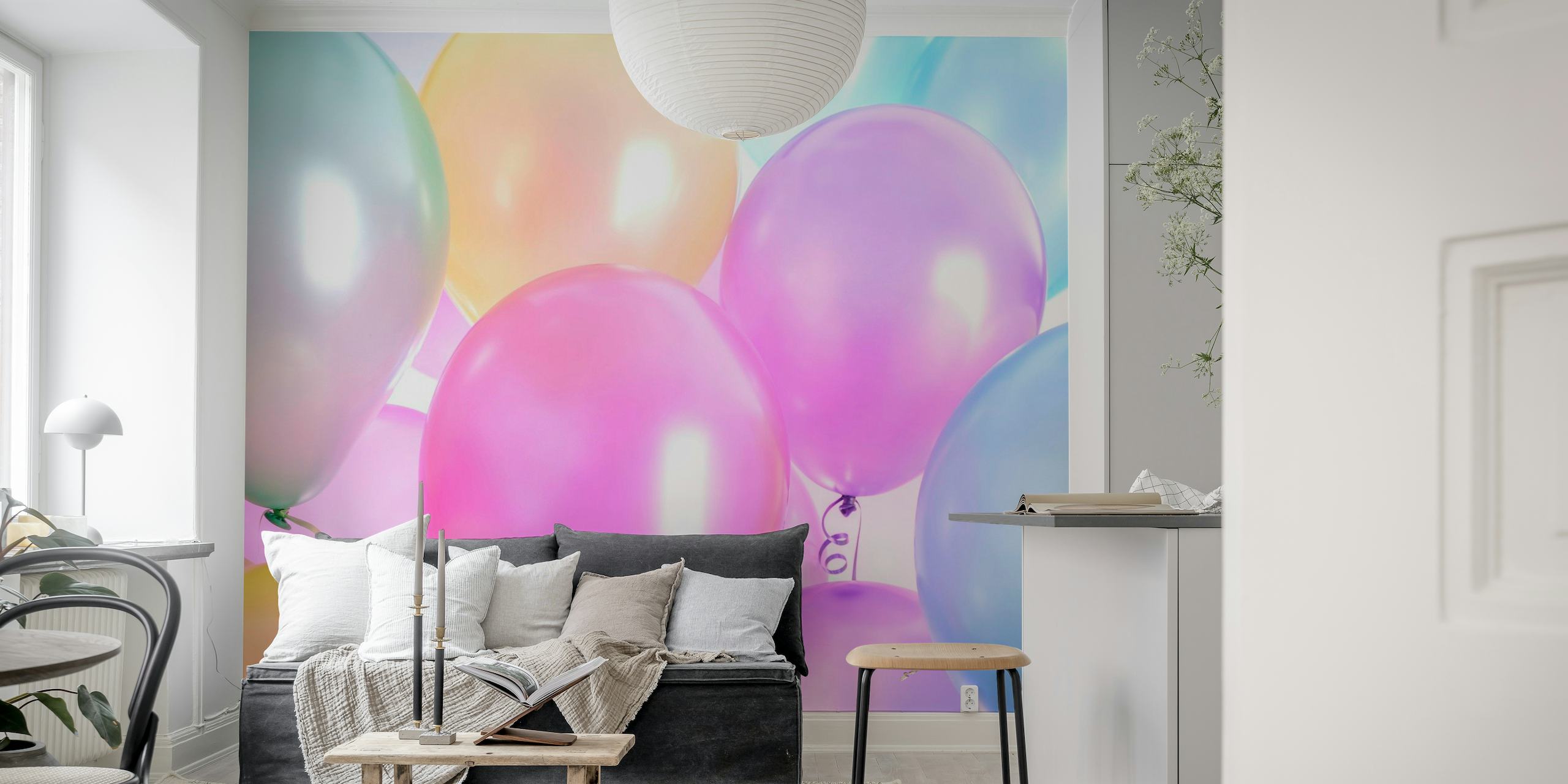 Diverse pastelkleurige ballonnen muurschildering op Happywall