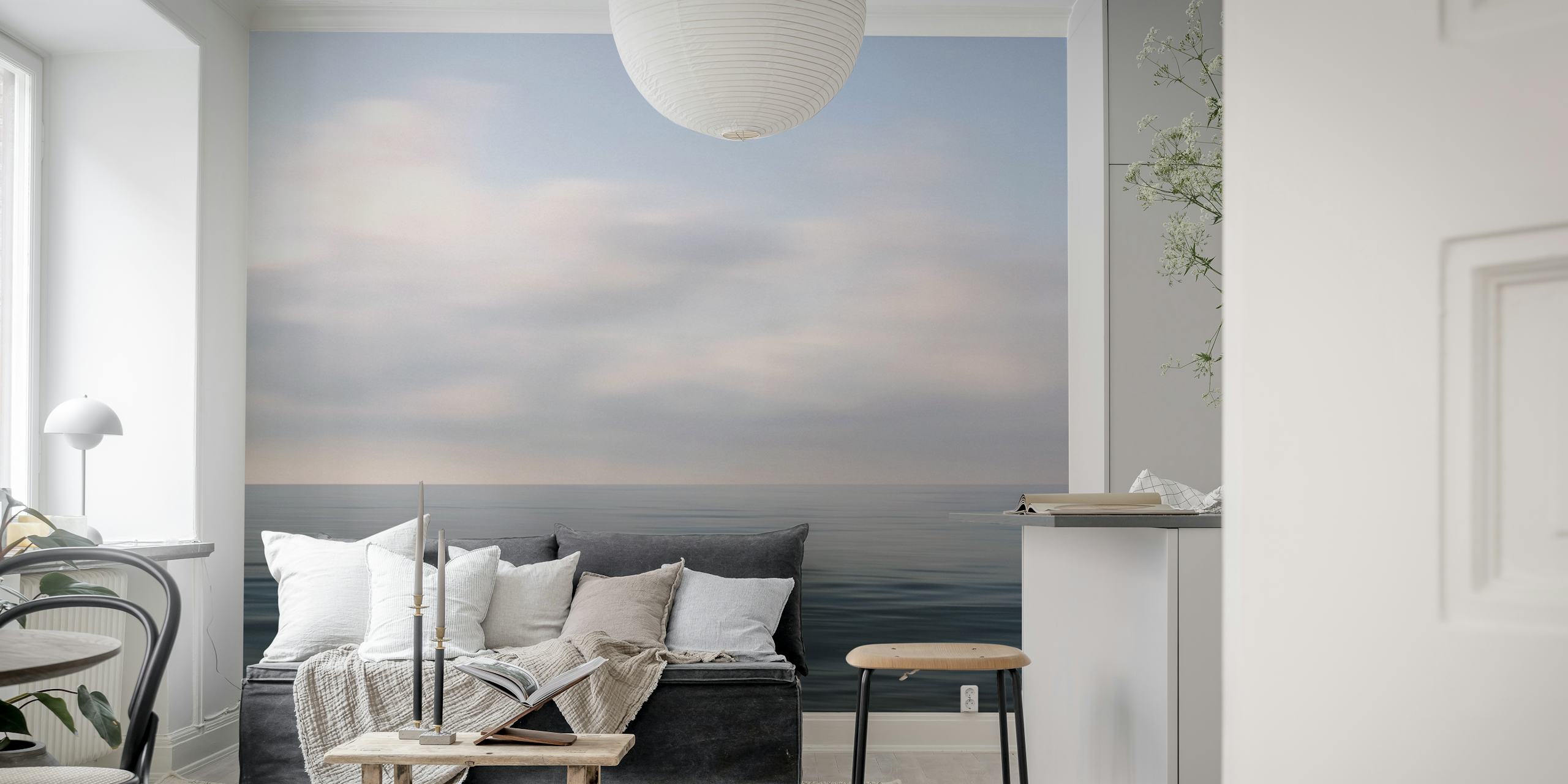 Ocean horizon with cloudy sky and calming blue tones wallpaper