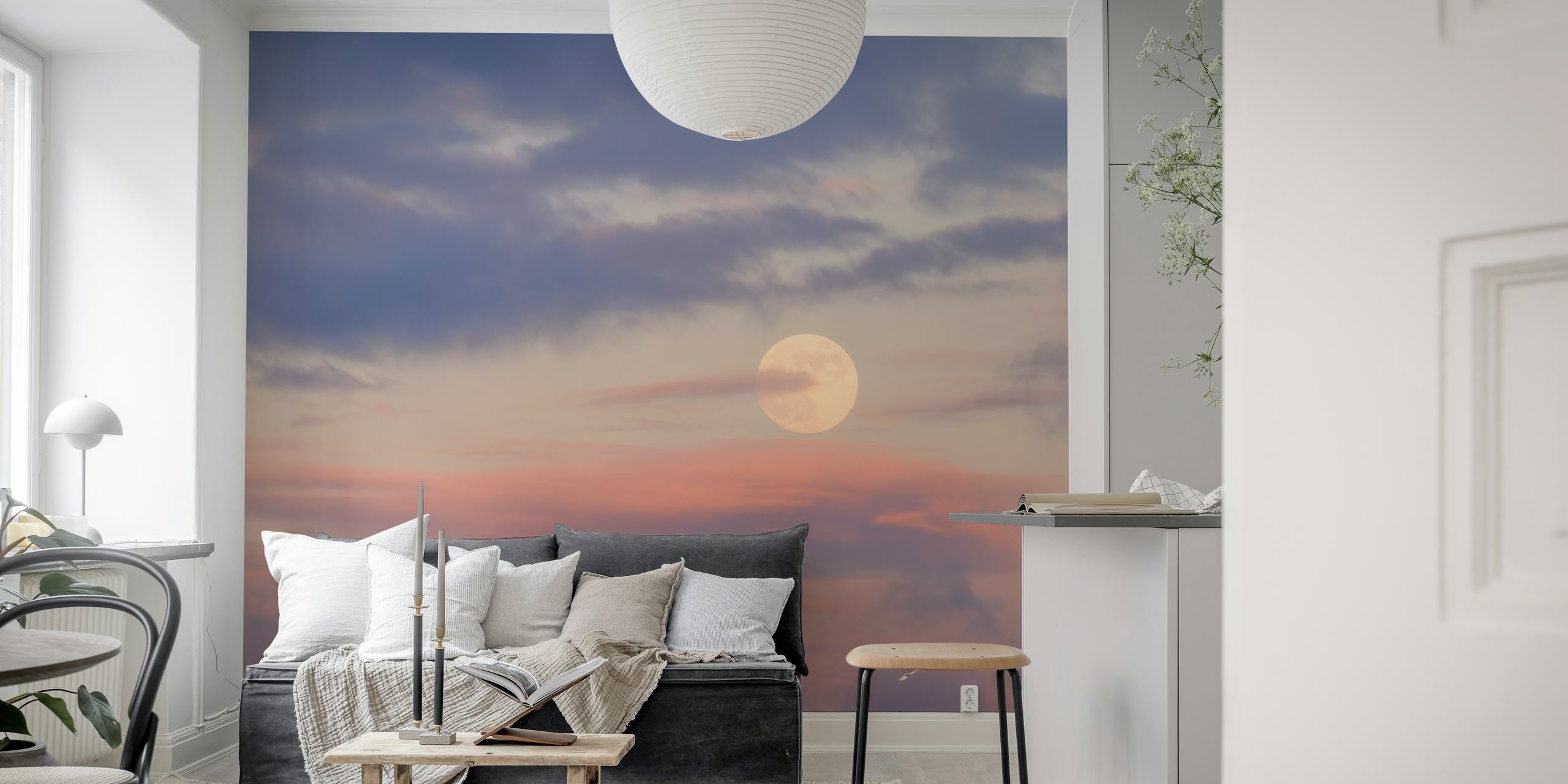 Pastel clouds and a glowing moon in a gradient sky wallpaper