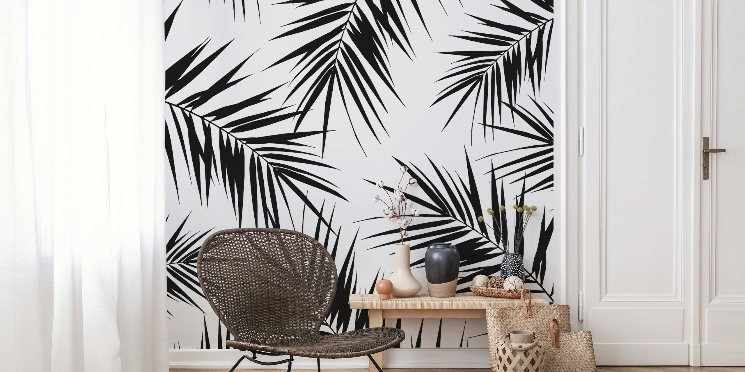 Black palm leaves pattern on white background wallpaper