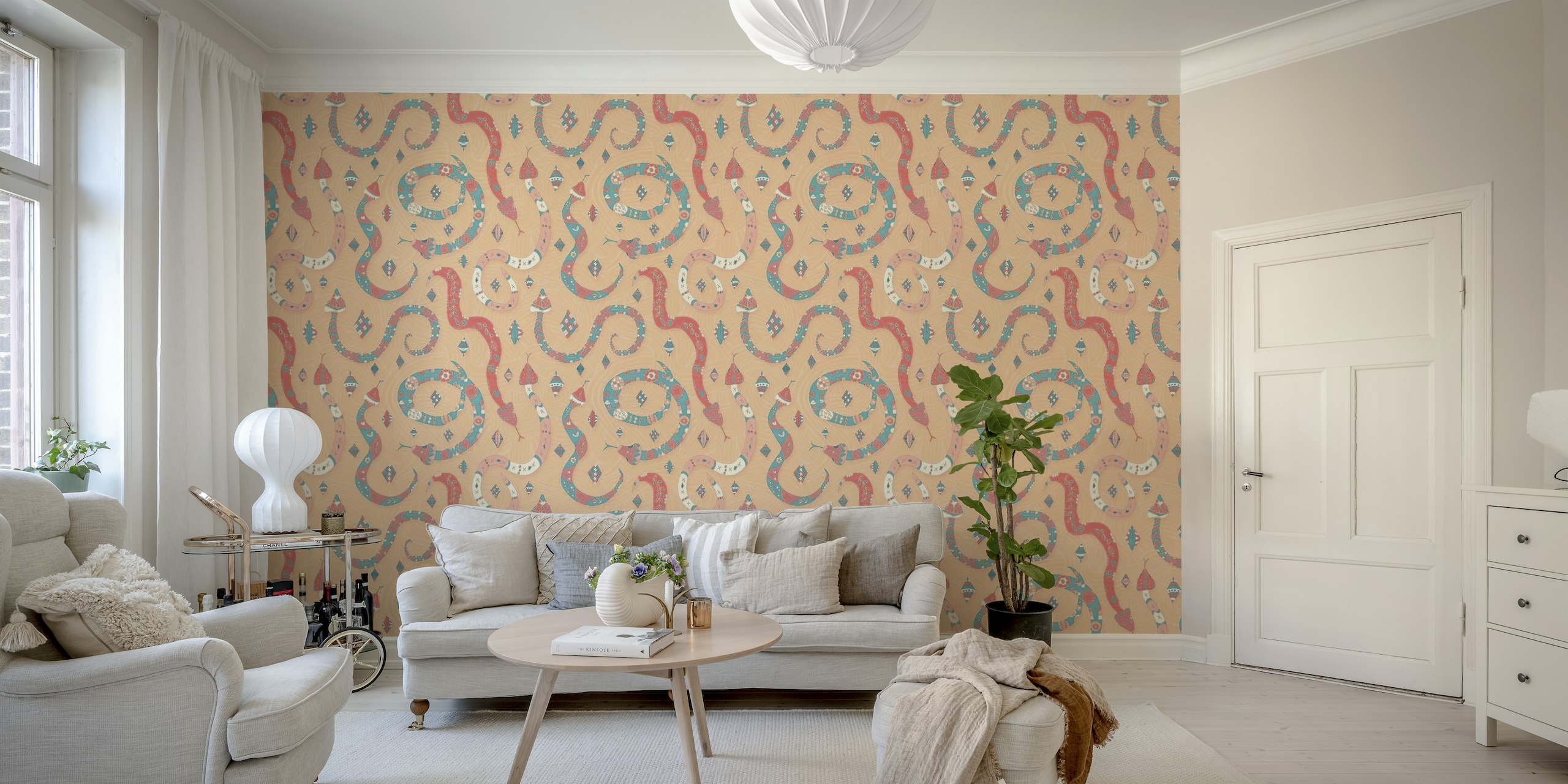 Illustrative peach-colored wall mural featuring red patterned snakes with decorative motifs