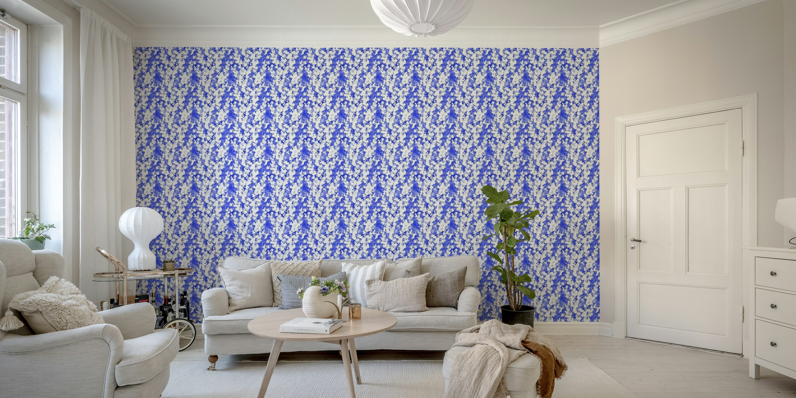 Cherry blossom silhouettes on blue behang