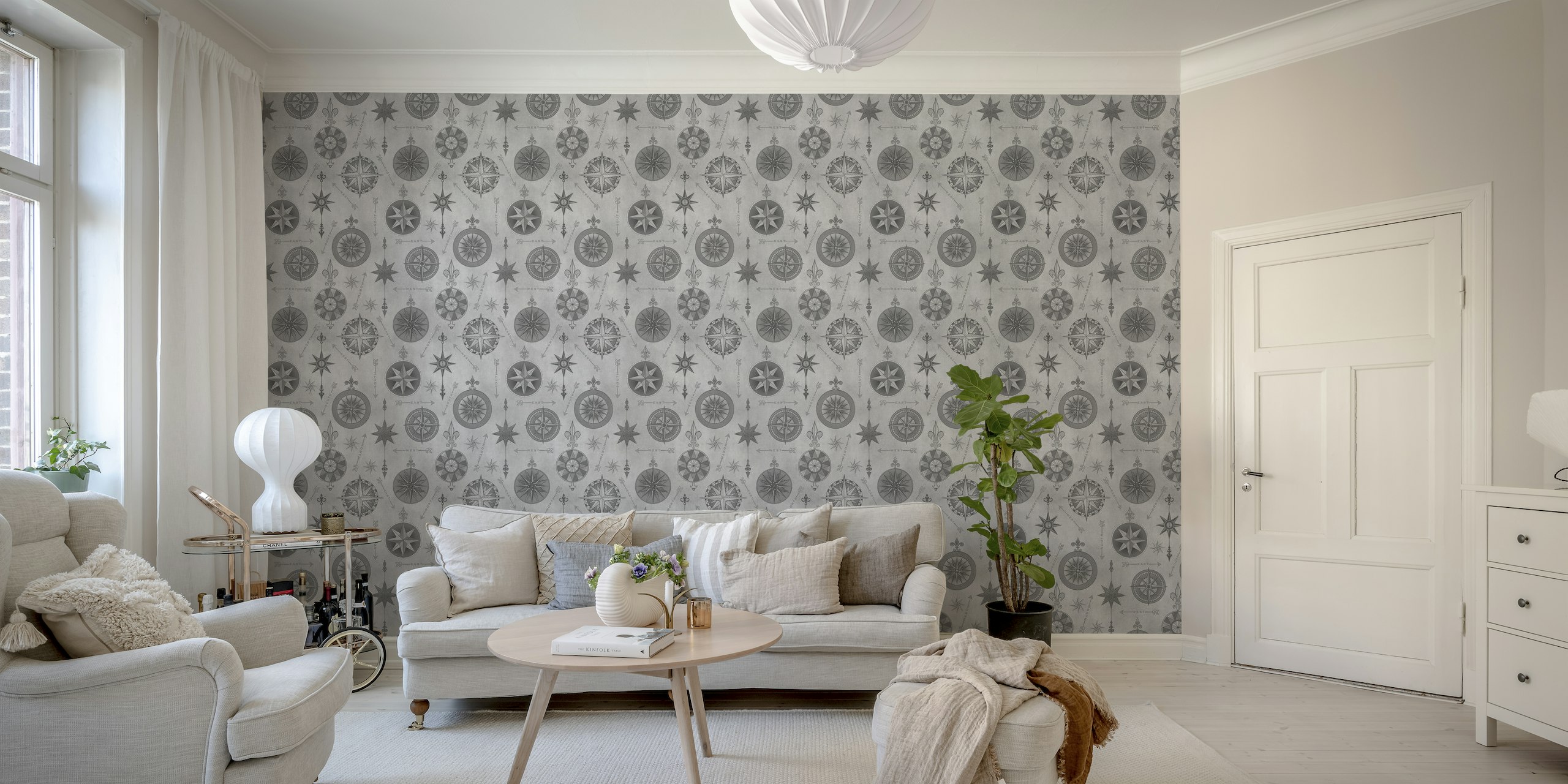 Vintage compass pattern wall mural on a grey background