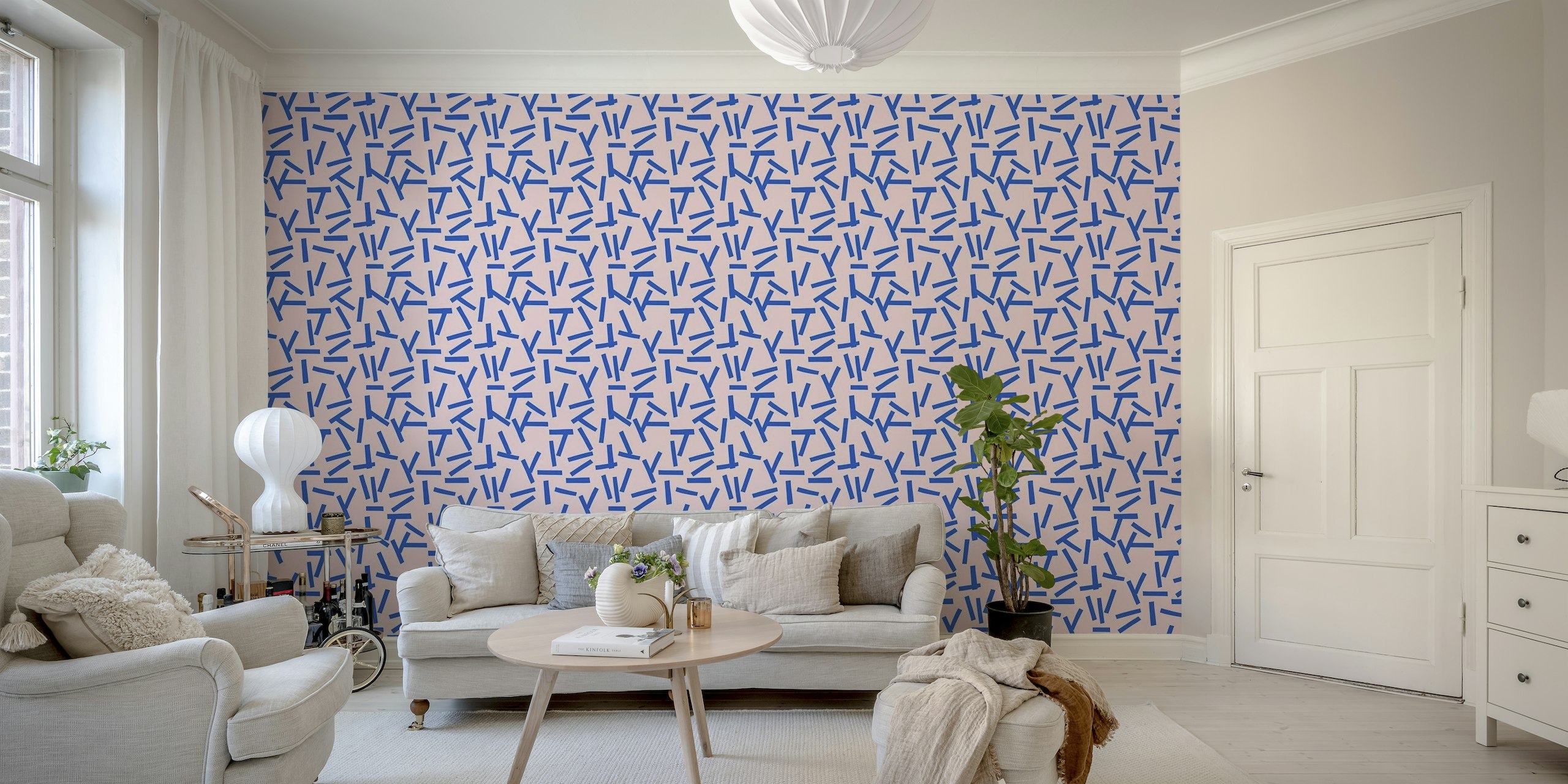 Abstract wall mural with blue strokes on a pink background