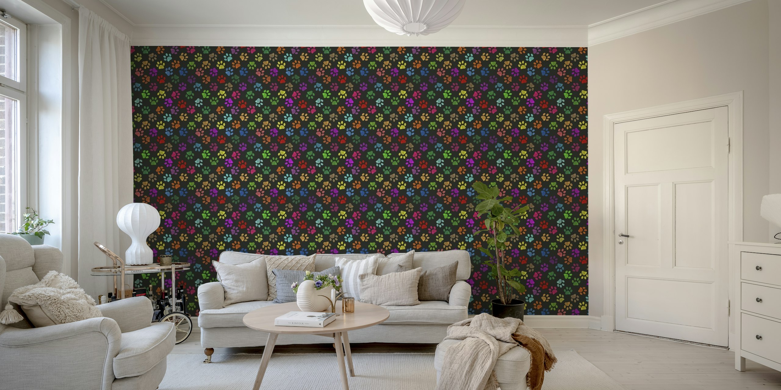 Colorful paw prints on black background wall mural