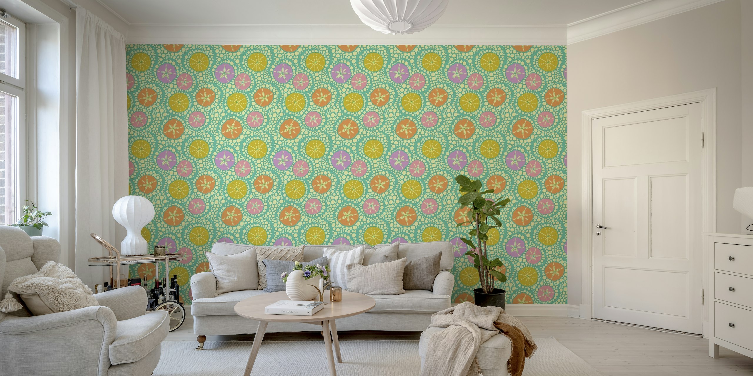Coastal beach-inspired wall mural with sea urchins and sand dollars on a teal background