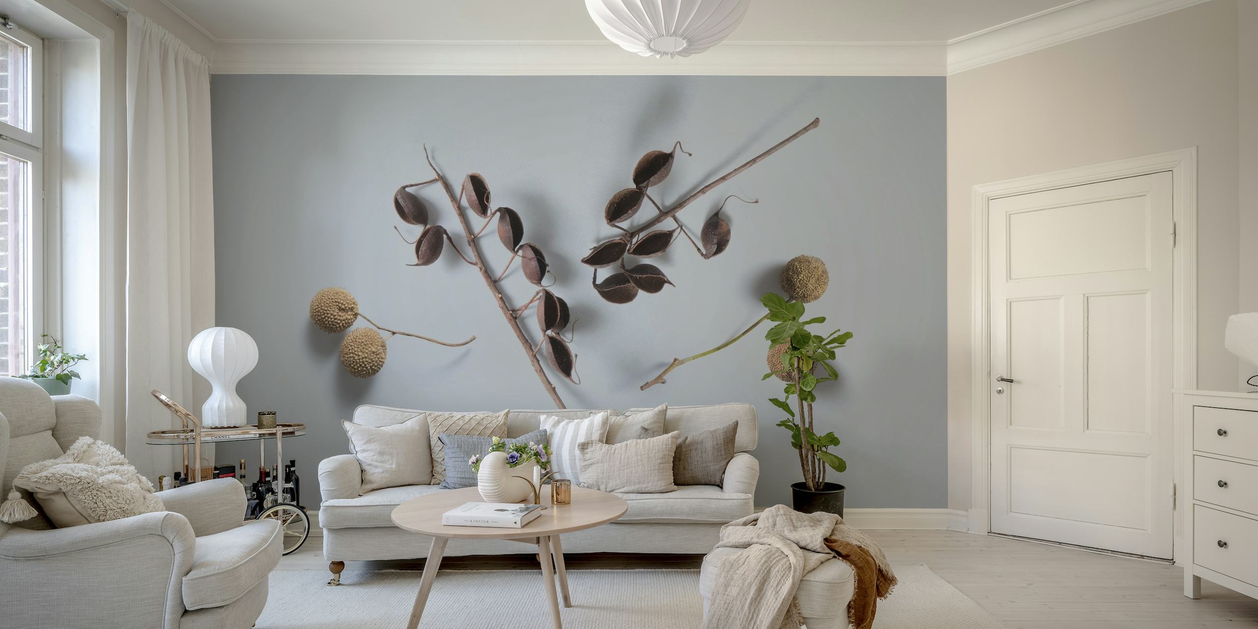 Zen-inspired wall mural with dried plants on a gray background