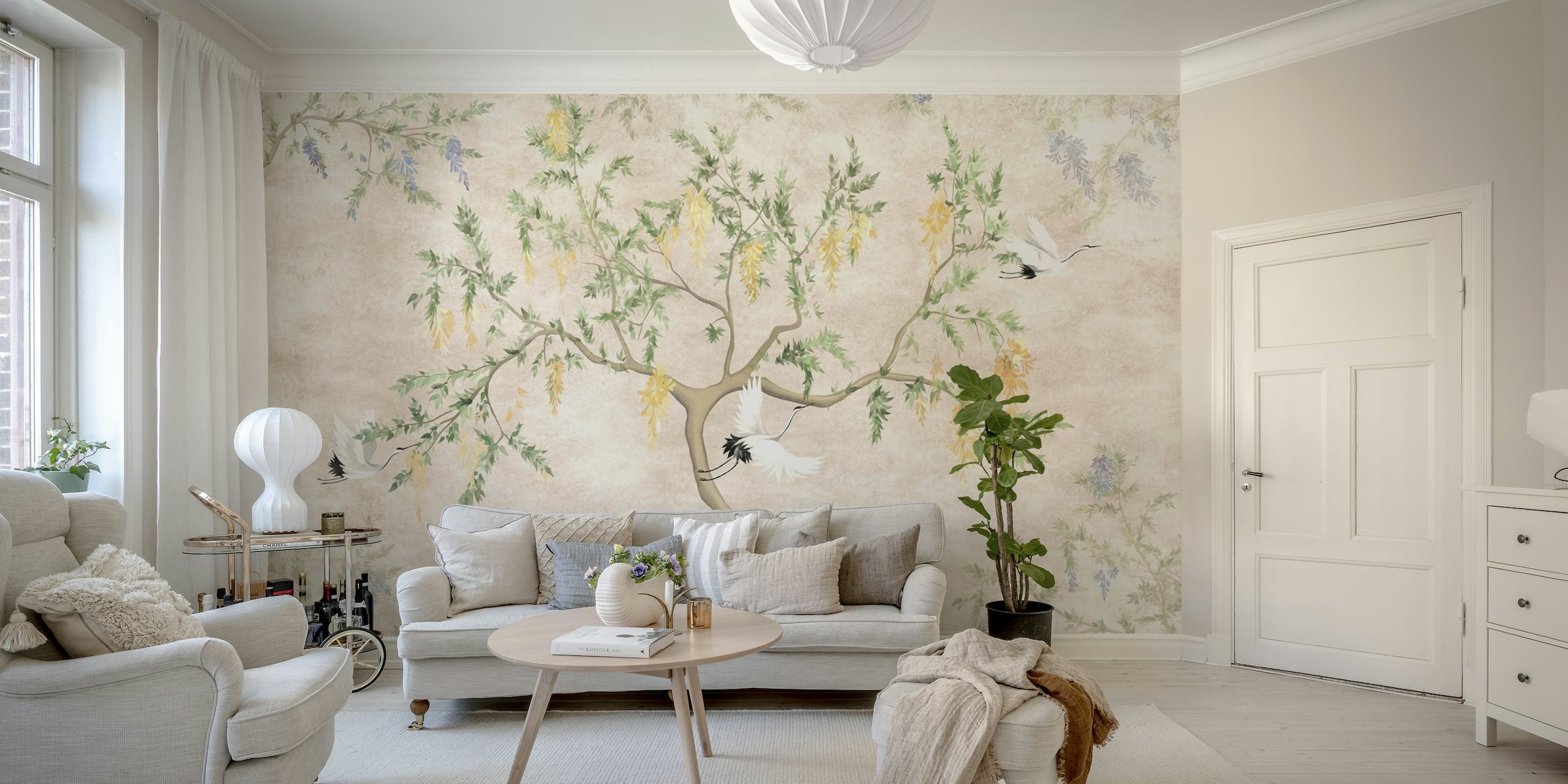 Flying cranes wall mural with pastel hues and tree branches