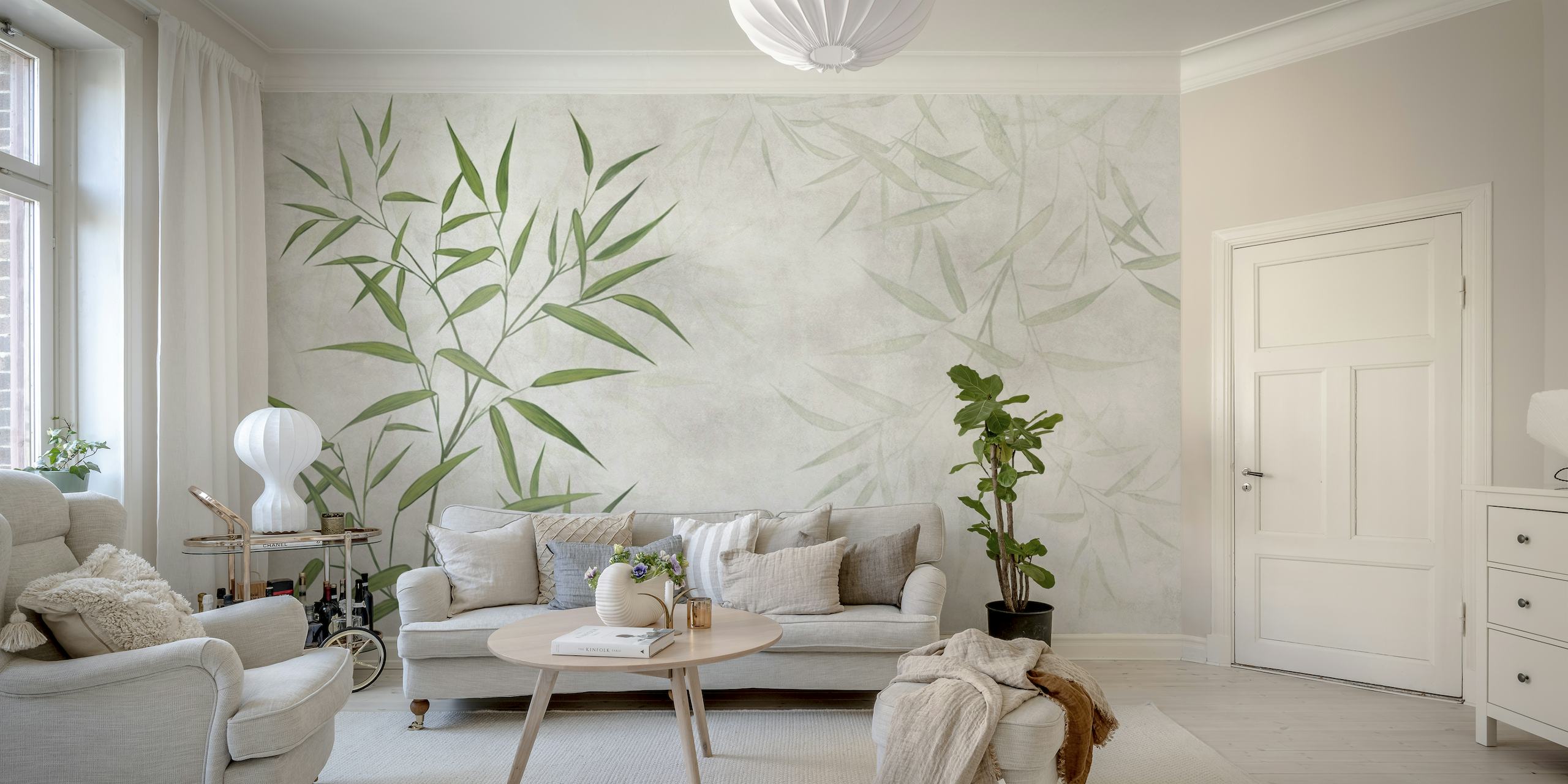 Green bamboo leaves against a grey concrete background wall mural