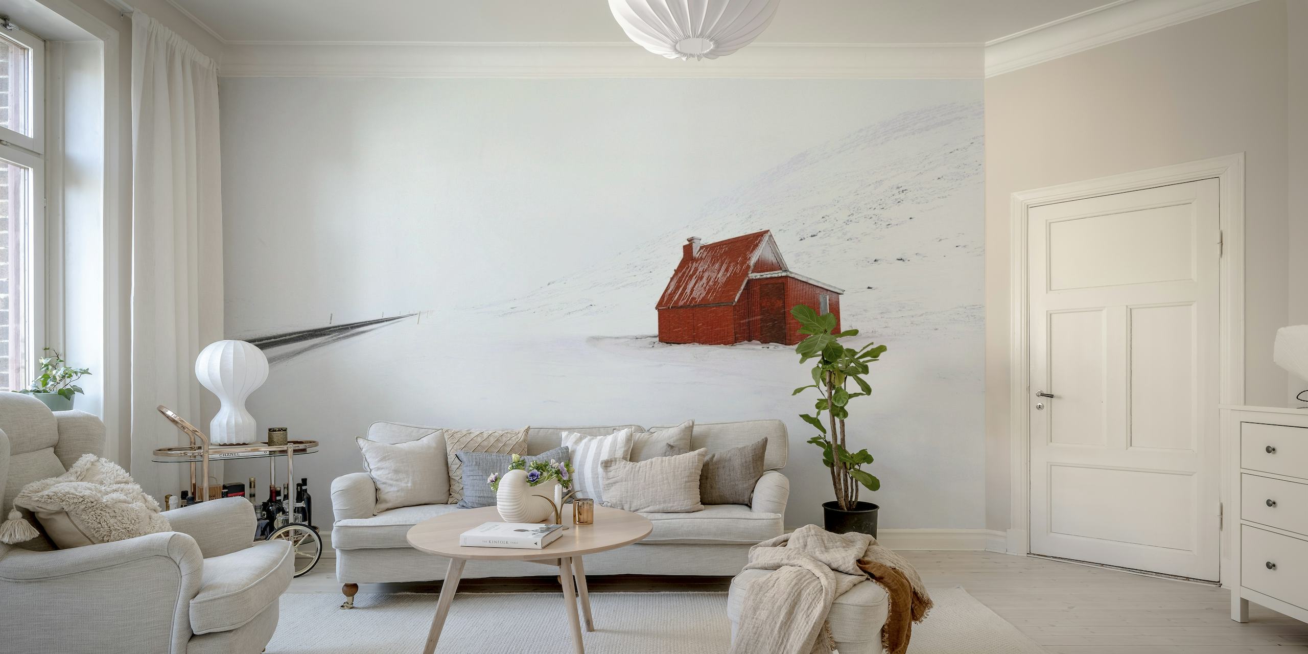 Red little house in a snowy landscape wall mural