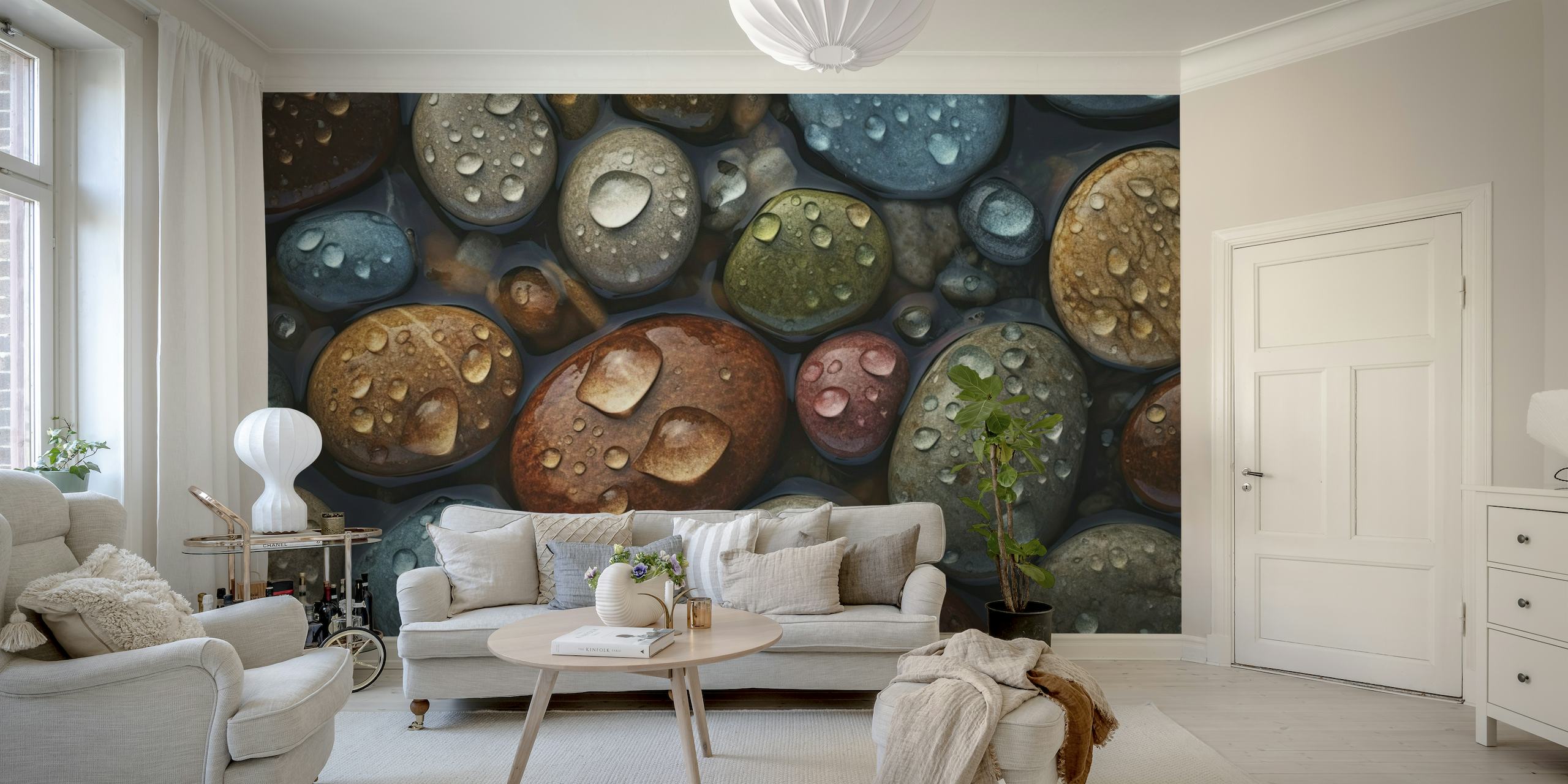 Zidni mural koji prikazuje krupni plan šarenih kamenčića s kapljicama vode, evocirajući primorski ambijent